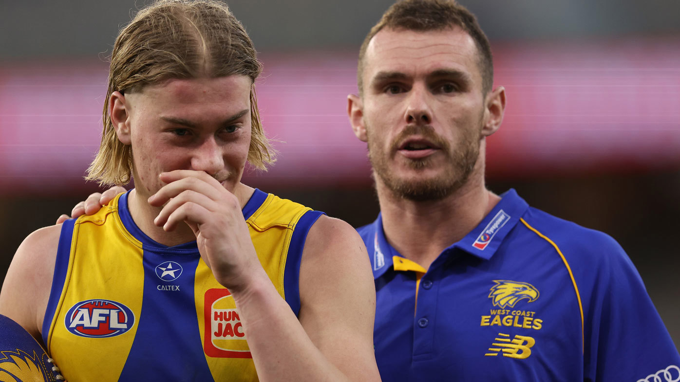 West Coast Eagles star Harley Reid is consoled by Luke Shuey.