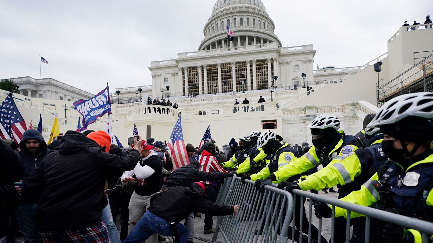 The riot left more than 100 police officers injured, many beaten and bloodied, as the crowd of pro-Trump rioters, some armed with pipes, bats and bear spray, charged into the Capitol. At least nine people who were there died during and after the rioting, including a woman who was shot and killed by police.