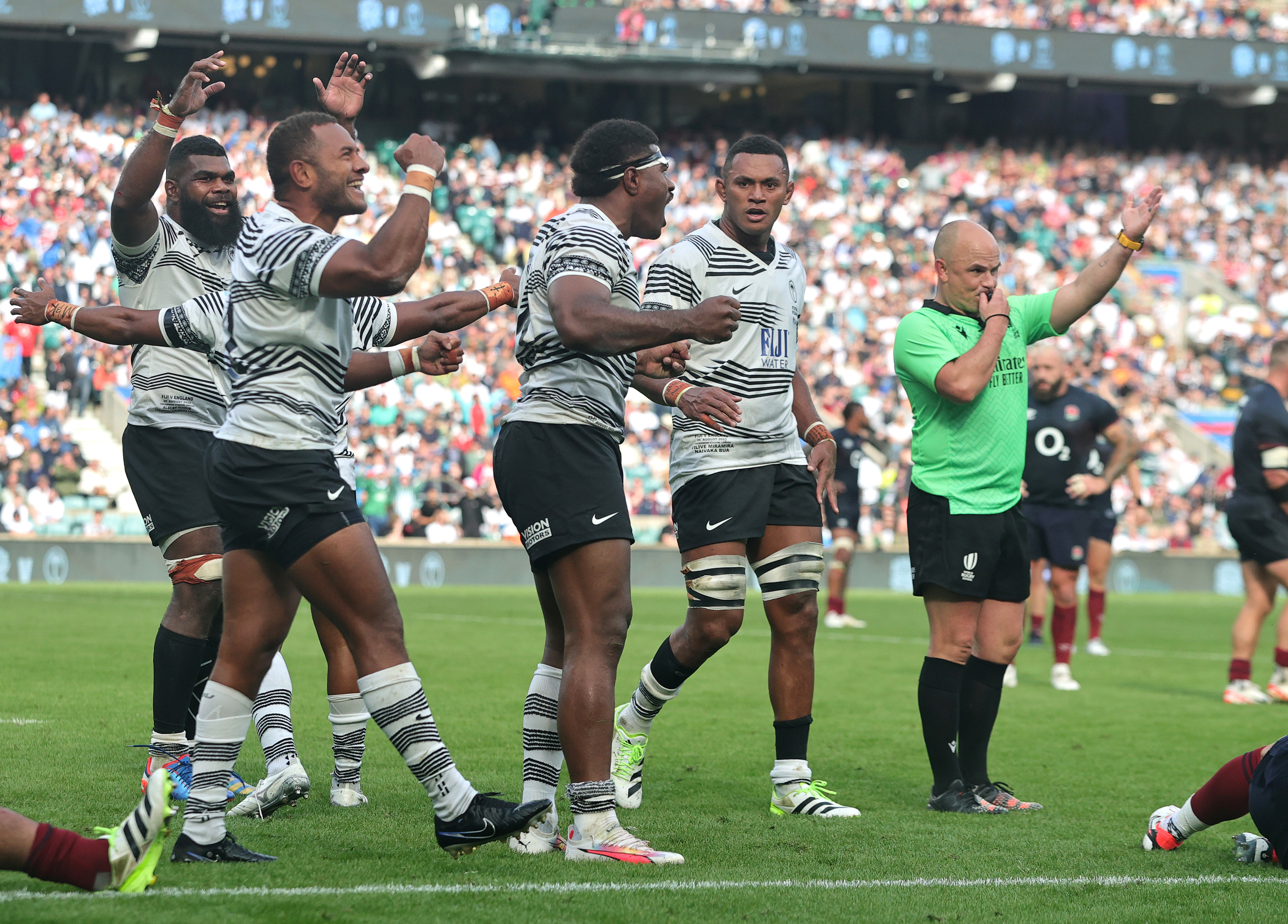 Fiji celebrate their historic victory over England.