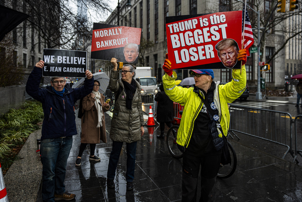 Protestors demonstrate outside Federal Court, Thursday, Jan. 25, 2024, in New York. 