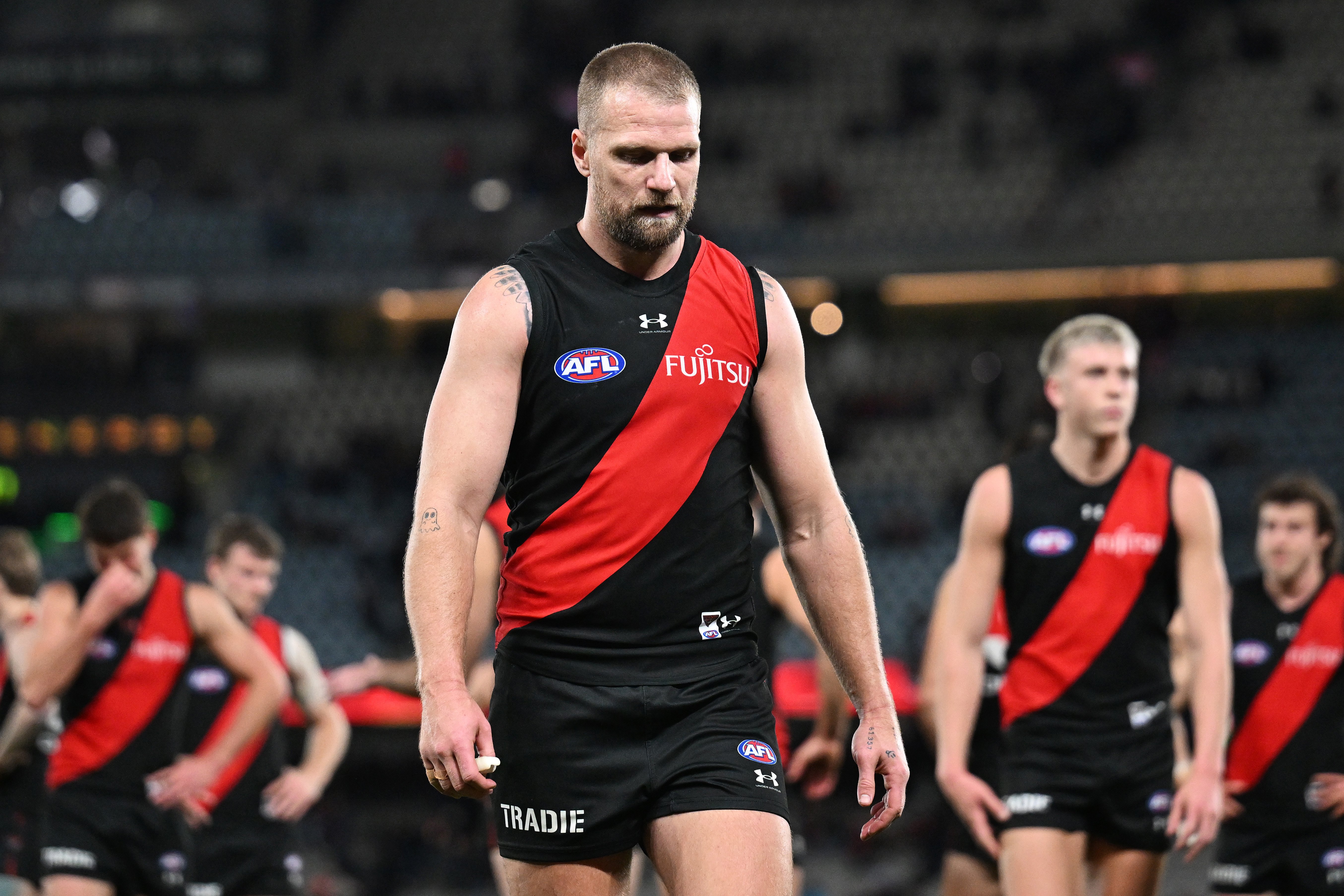 Jake Stringer of the Bombers looks dejected after thier loss to Adelaide in round 19.