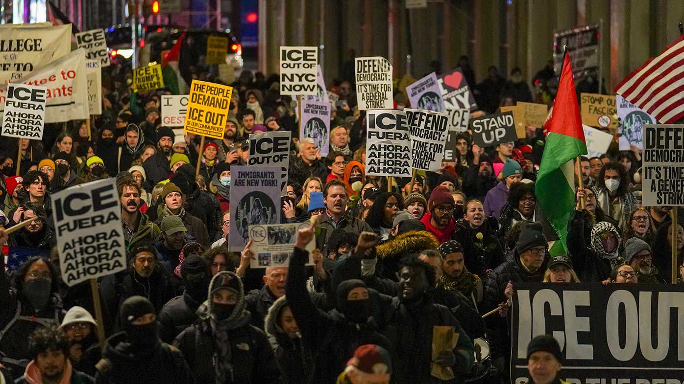 People participate in a protest in response to the fatal shooting of Renee Nicole Good in Minneapolis.