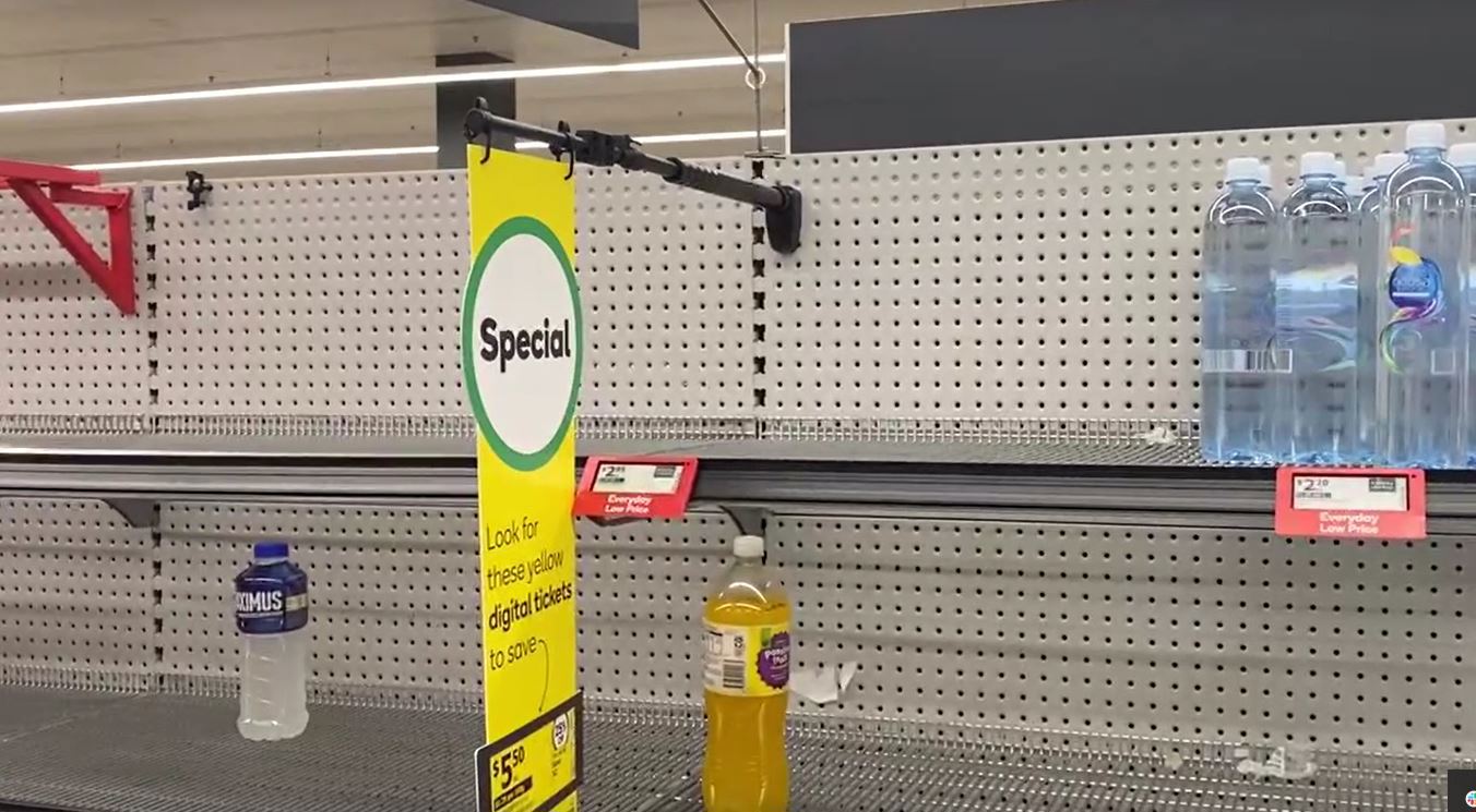 Supermarket shelves along the south-east Queensland coast have been stripped bare as Tropical Cyclone Alfredinches closer to the coastline.