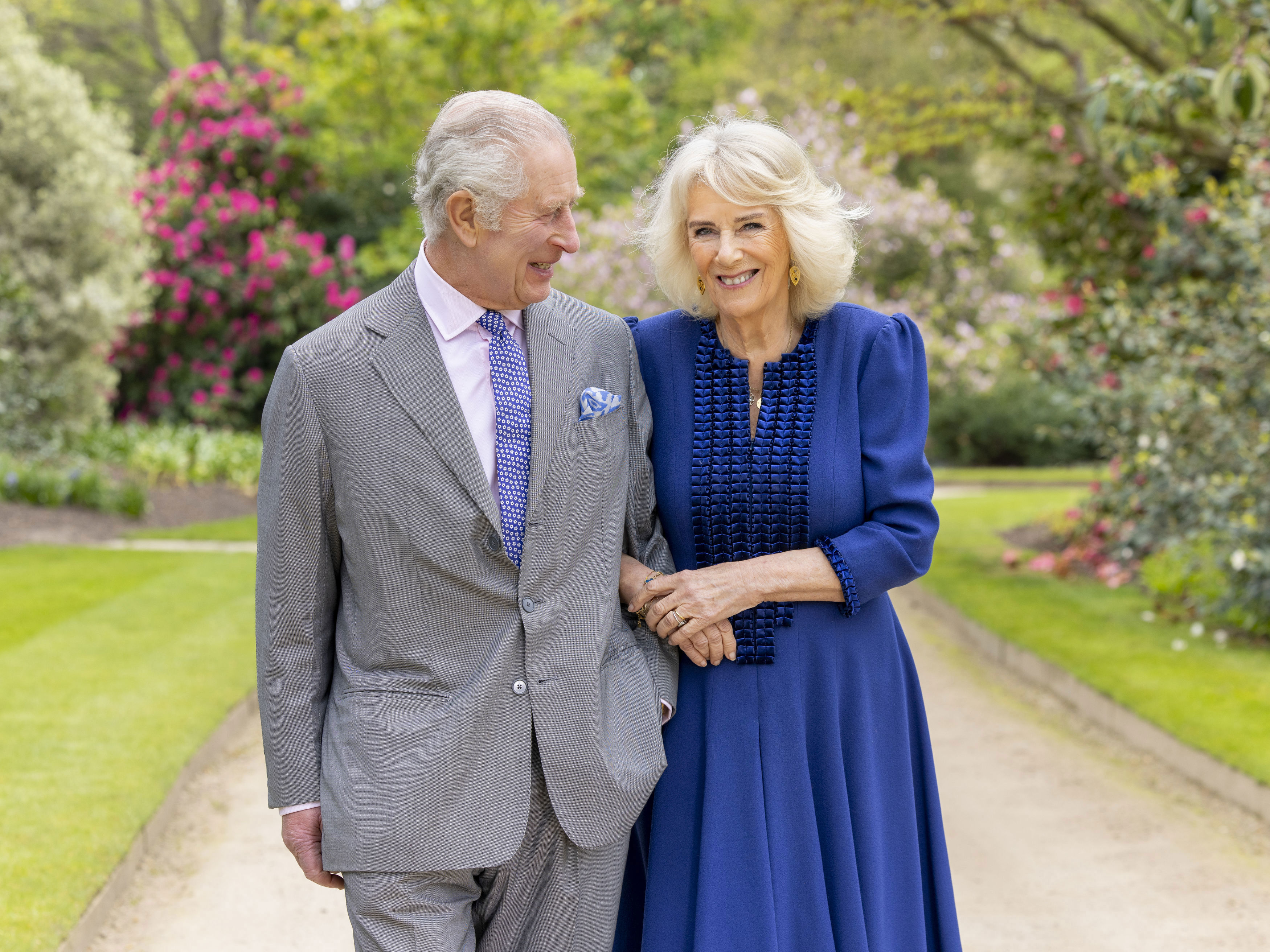 King Charles III and Queen Camilla stand in Buckingham Palace Gardens on Wednesday April 10, 2024, the day after their 19th wedding anniversary.    