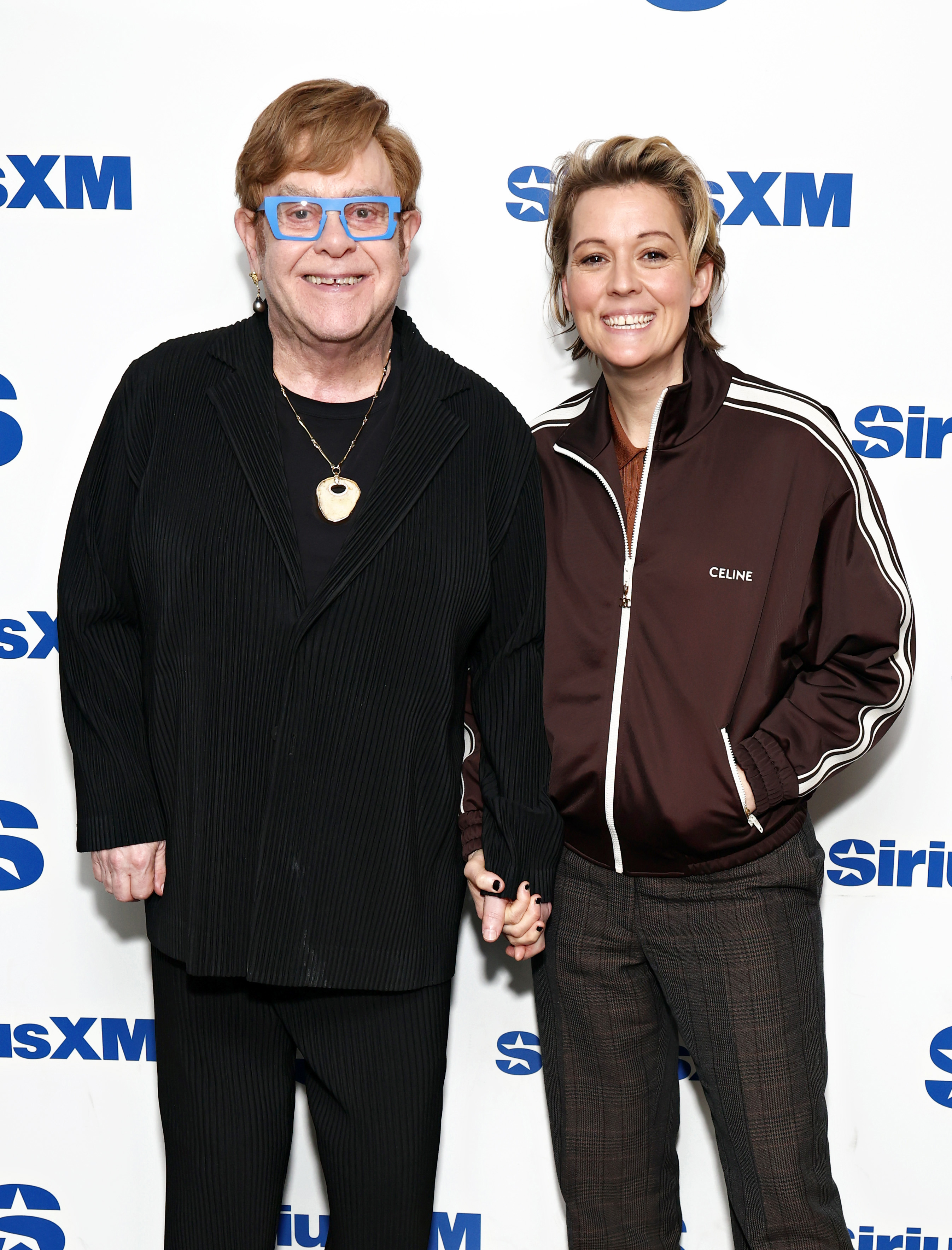 Elton John and Brandi Carlile visit SiriusXM's 'The Howard Stern Show' at SiriusXM Studios on April 07, 2025 in New York City.