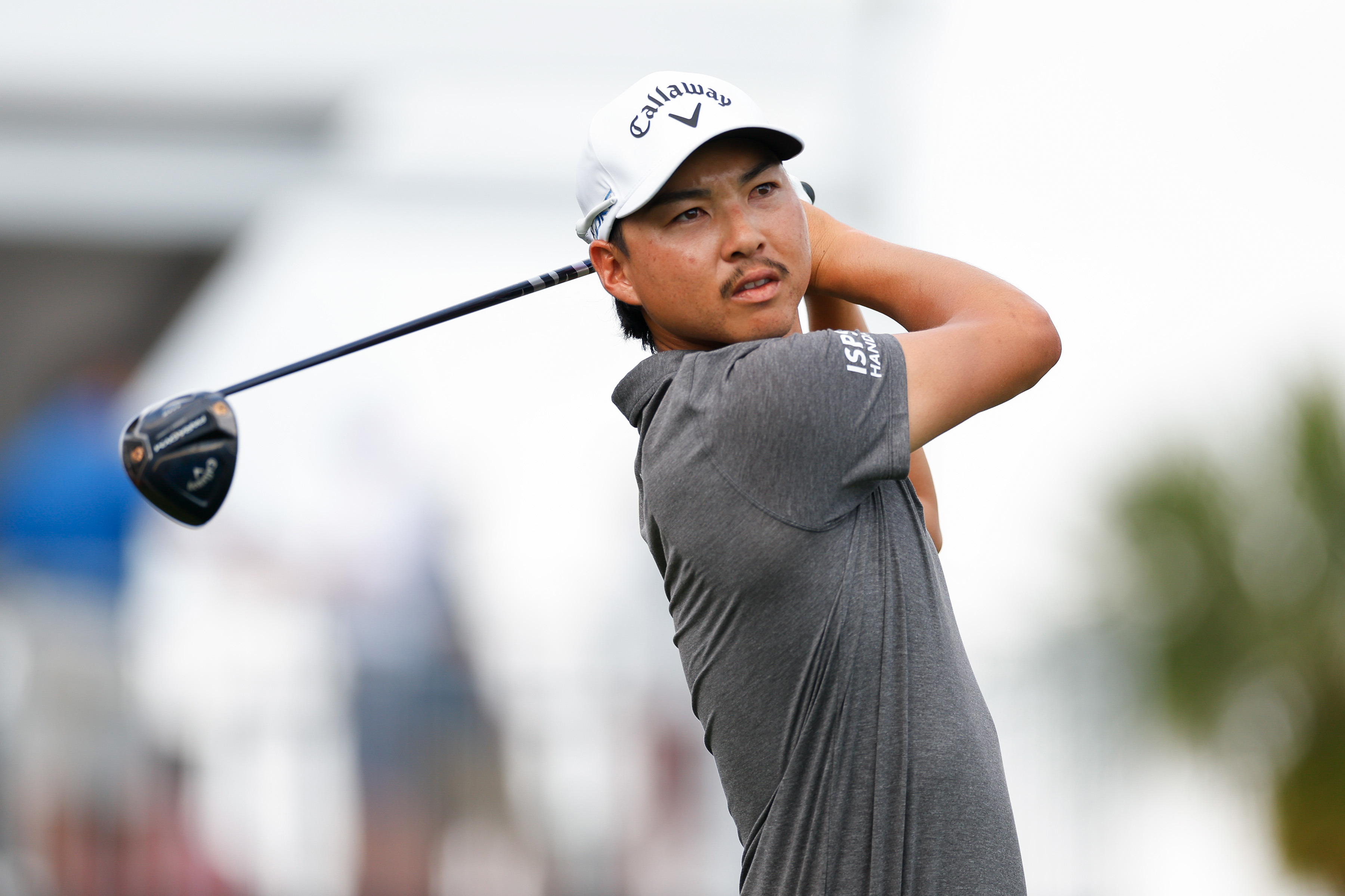 Min Woo Lee of Australia hits a tee shot at the Arnold Palmer Invitational.