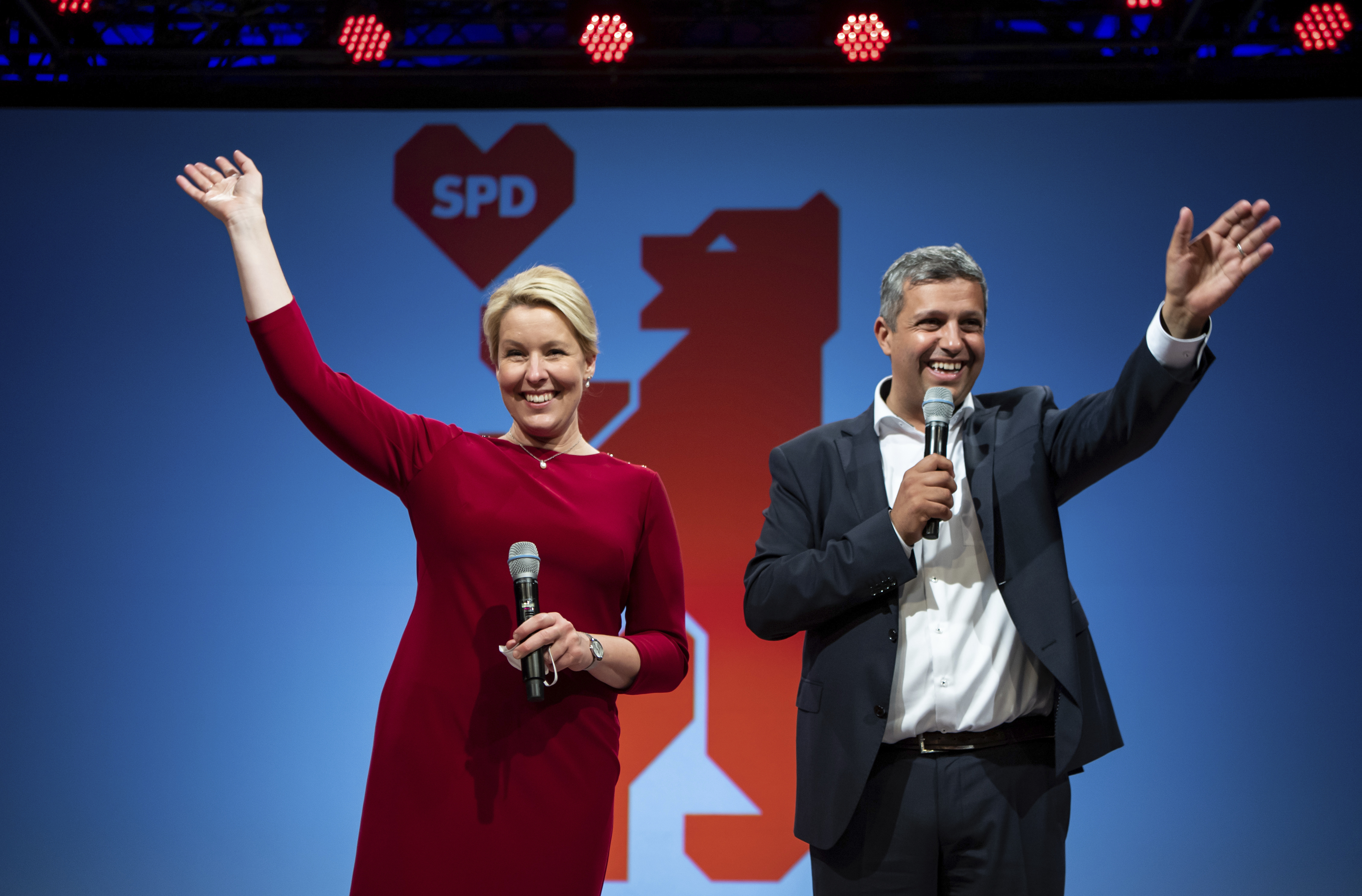 Franziska Giffey, left, top candidate of the Berlin SPD for the office of Governing Mayor, and Raed Saleh, co-party leader of the Berlin SPD take the stage at the election party of the Berlin SPD in Kreuzberg, Berlin on Sunday. 