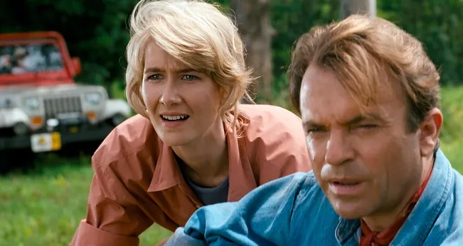 Laura Dern and Sam Neill on the set of Jurassic Park in 1993.