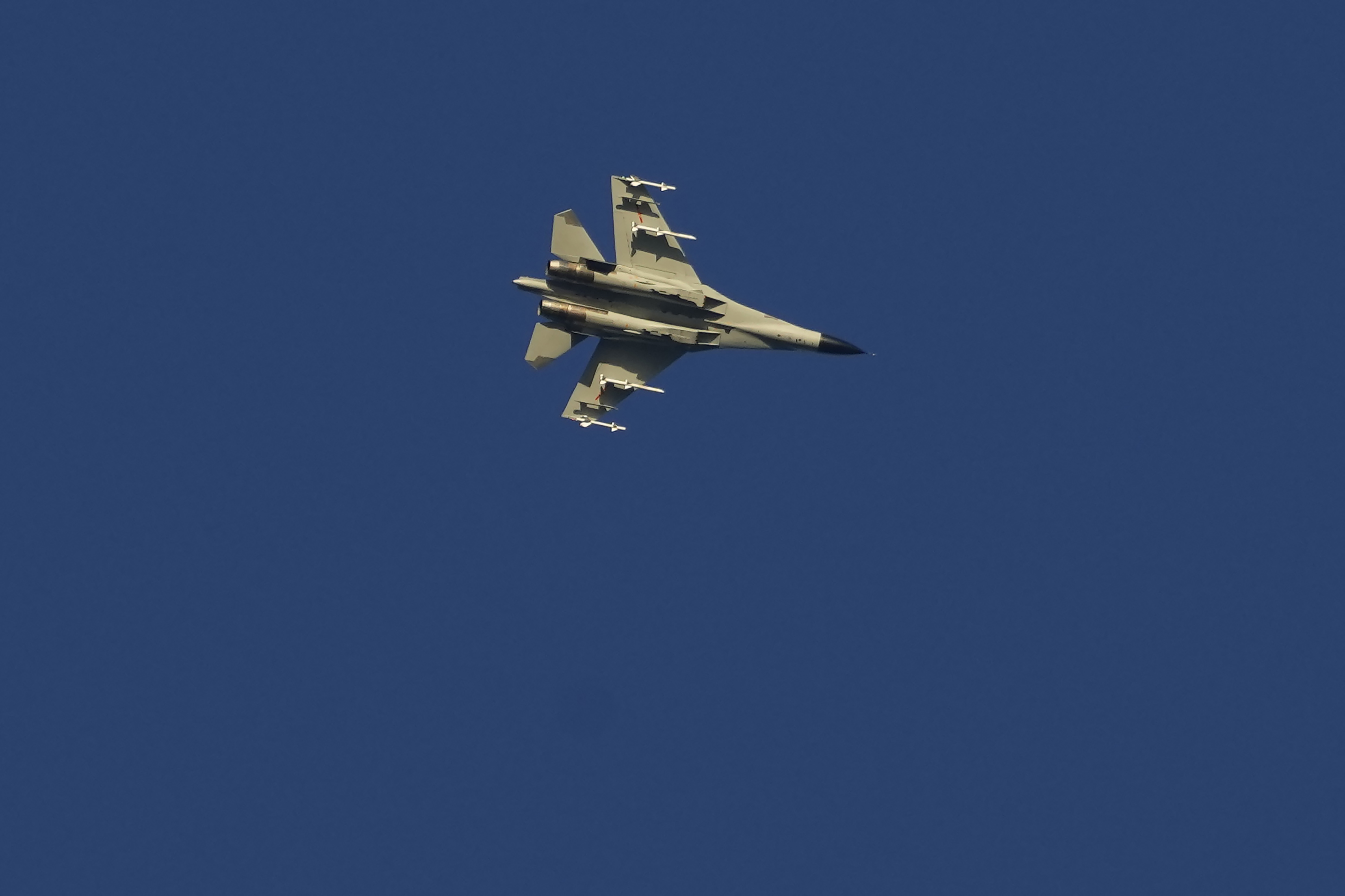 A military fighter jet flies above the Taiwan Strait on Friday, August 5, 2022.