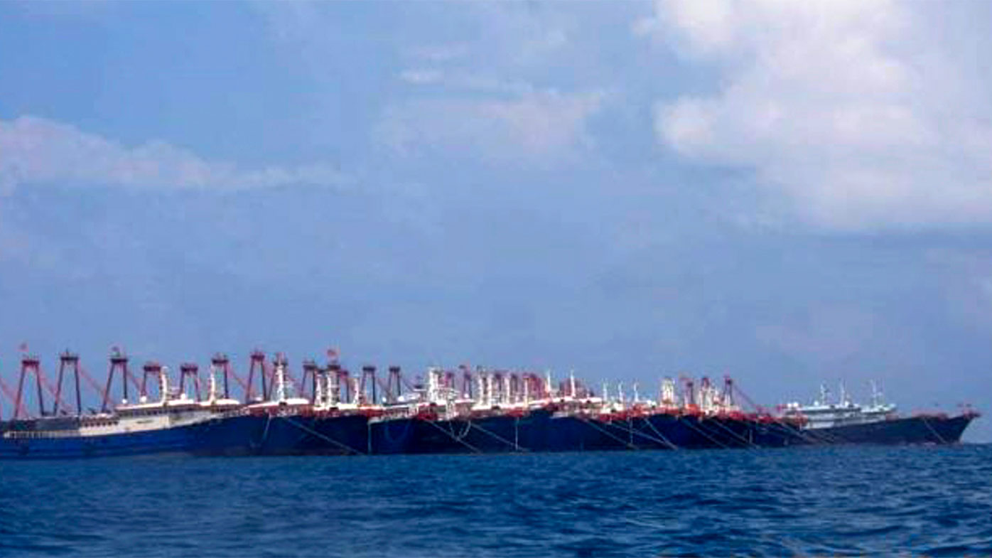 220 Chinese vessels are seen moored at Whitsun Reef, South China Sea.