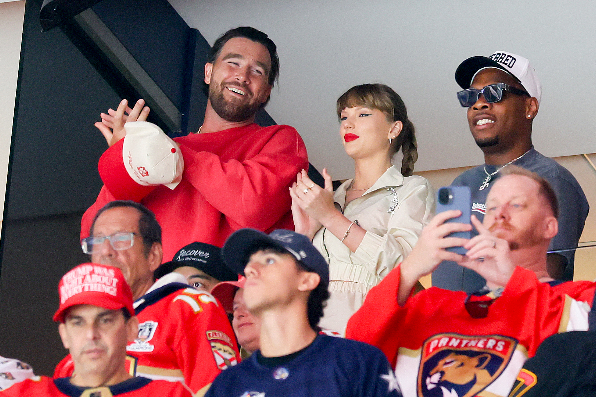 SUNRISE, FLORIDA - JUNE 12: Travis Kelce, left, and Taylor Swift react as the Edmonton Oilers and the Florida Panthers play during the first period in Game Four of the 2025 Stanley Cup Final at Amerant Bank Arena on June 12, 2025 in Sunrise, Florida. (Photo by Bruce Bennett/Getty Images)