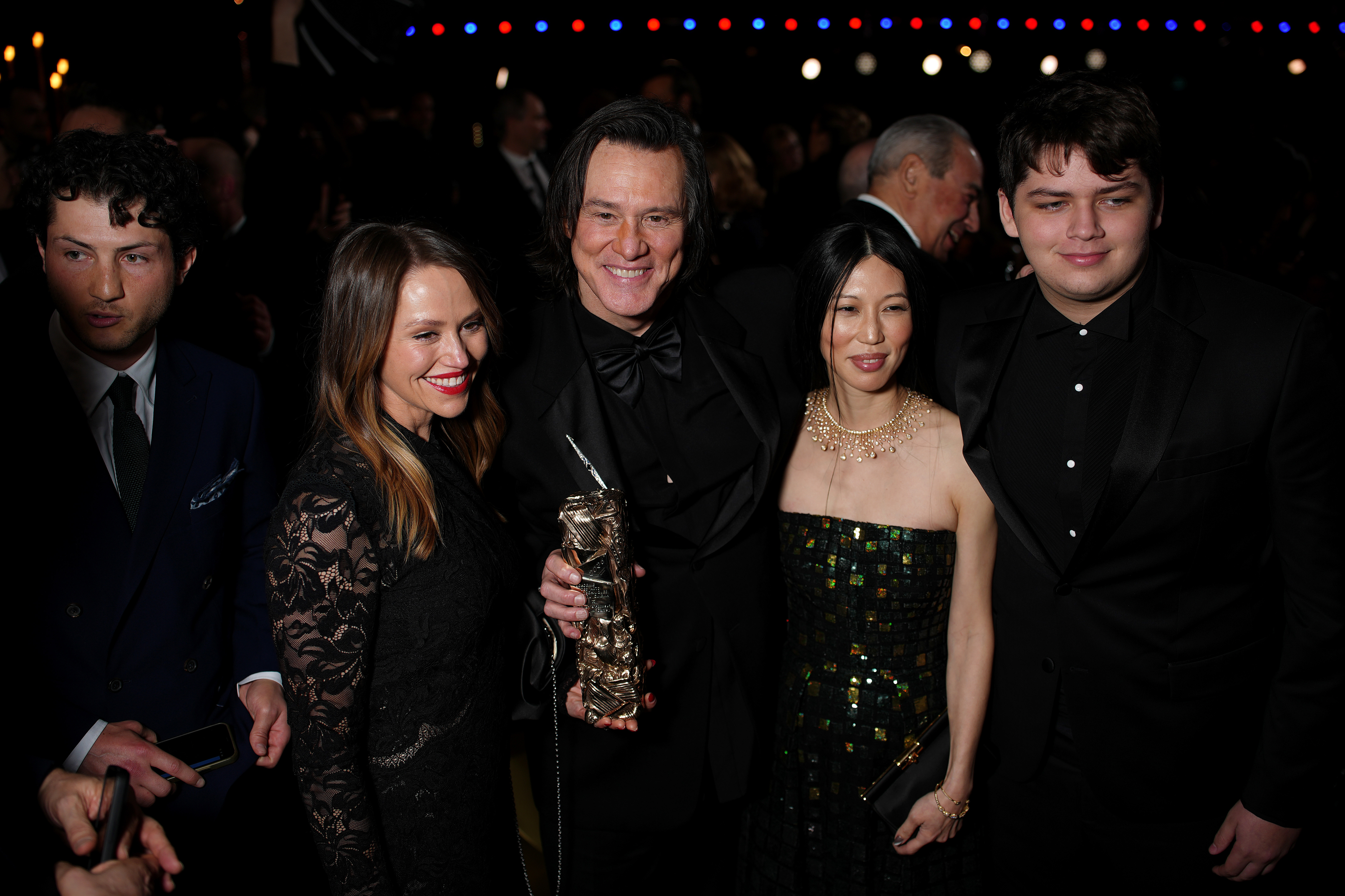 Jim Carrey, with daughter Jane Carrey, girlfriend Min Ah and grandson Jackson at the 51st Cesar Film Awards in Parus on February 26, 2026.