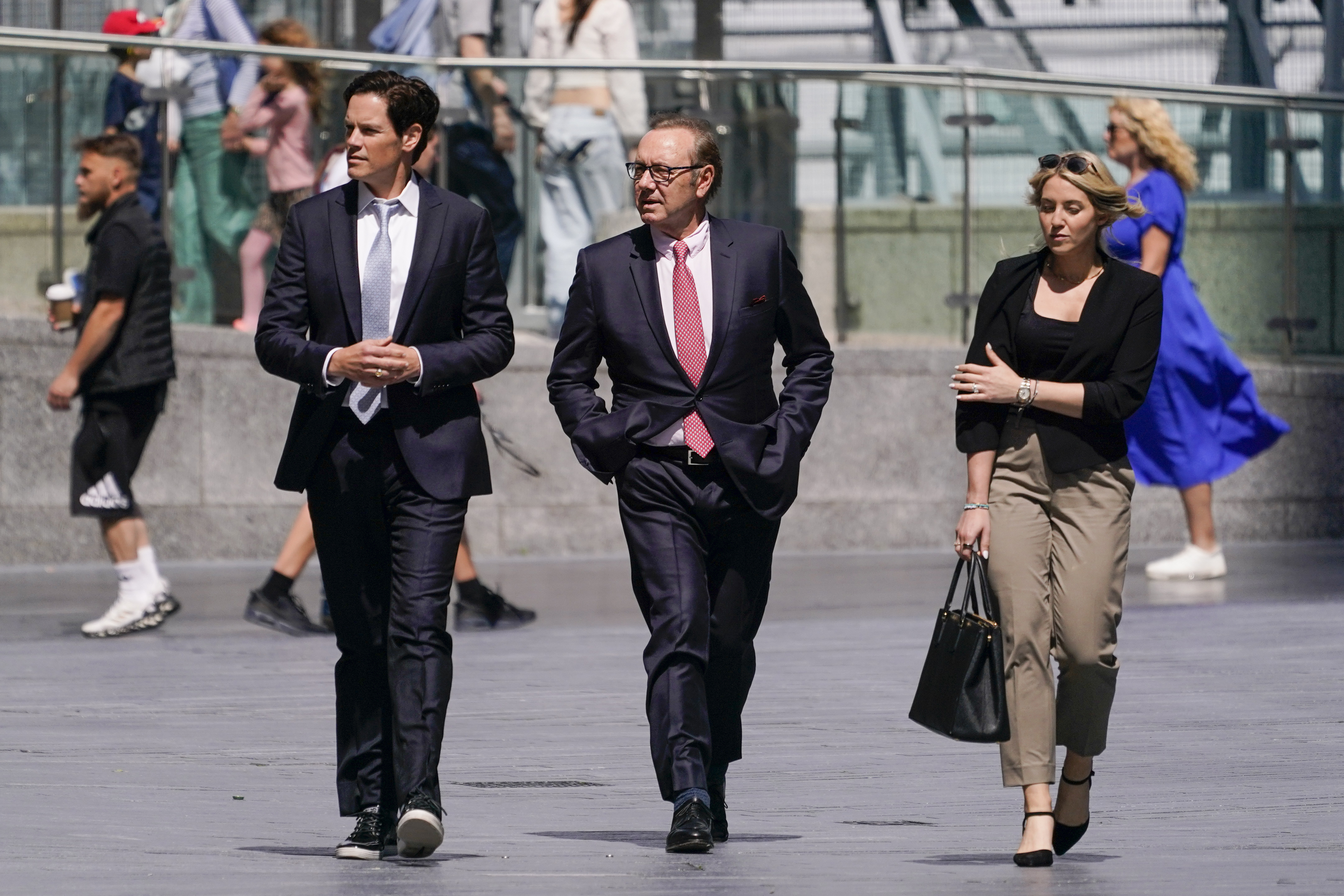 Actor Kevin Spacey, centre, arrives at Southwark Crown Court in London, Wednesday, July 26, 2023. 