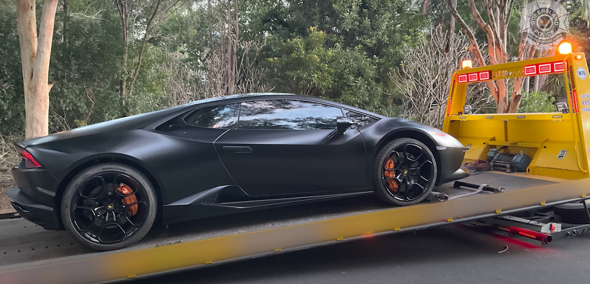 A Lamborghini Huracan ﻿and almost $424,000 in cash have been seized after a major police operation saw 20 people charged with more than 220 offences in Queensland. 