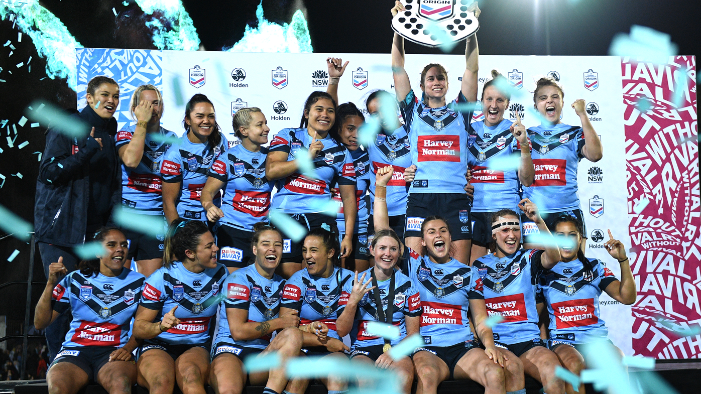 NSW players celebrate with the Women's State Of Origin Shield