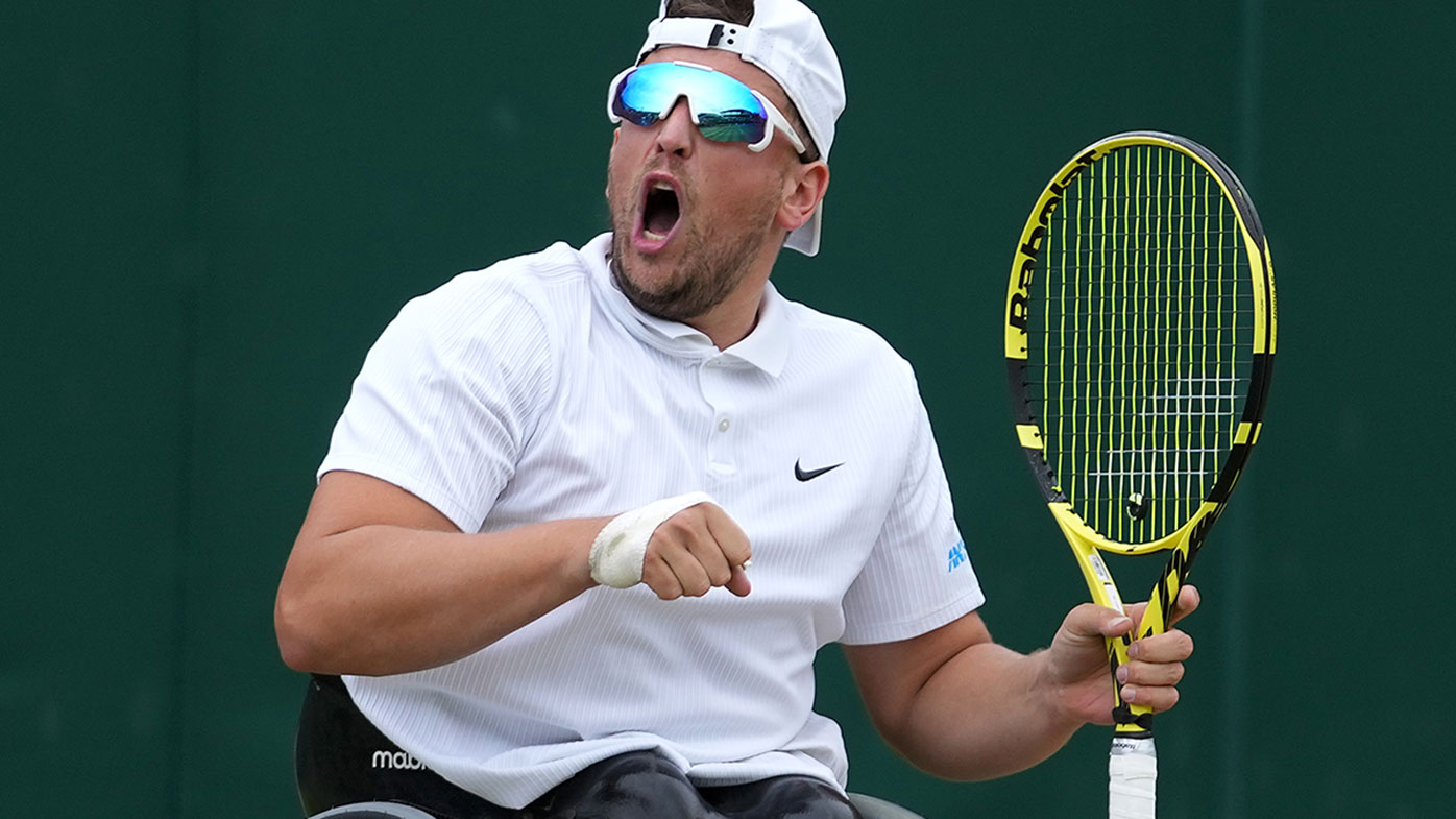 Dylan Alcott of Australia celebrates after winning his Quad Wheelchair Singles Final match against Sam Schroder of Netherlands at Wimbledon.