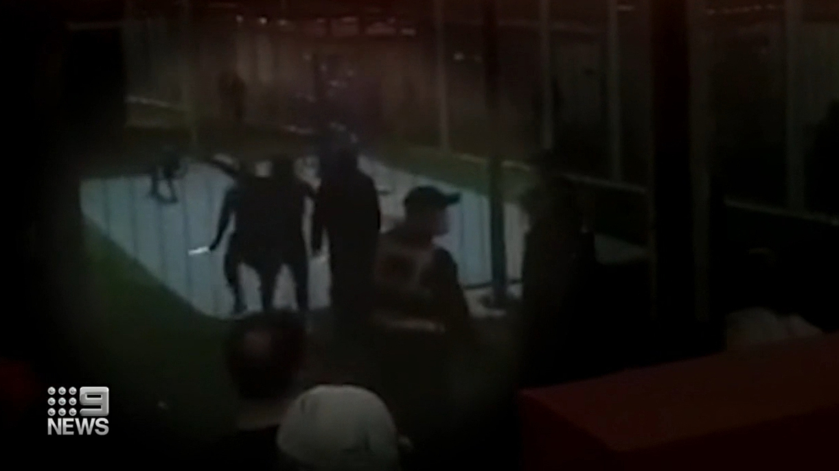 Footage shows one detainee swings a weapon, as another is whisked away by security, before the riot squad, swoops in taking two inmates into custody. 