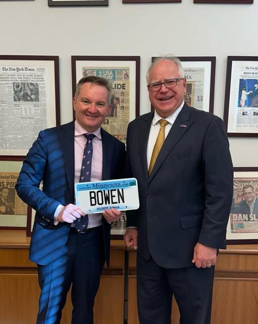 Climate Change Minister Chris Bowen received a license plate from Tim Walz.