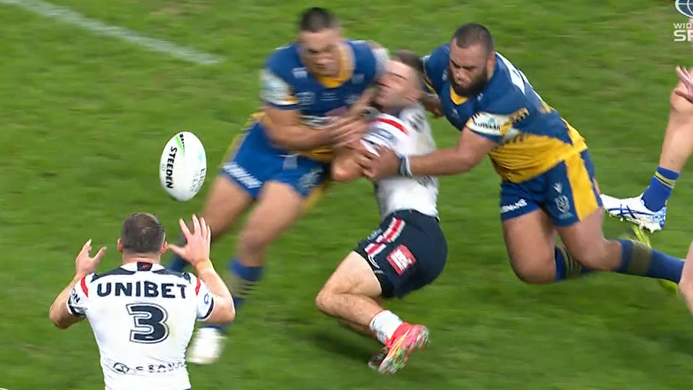 James Tedesco is floored by Marata Niukore. 
