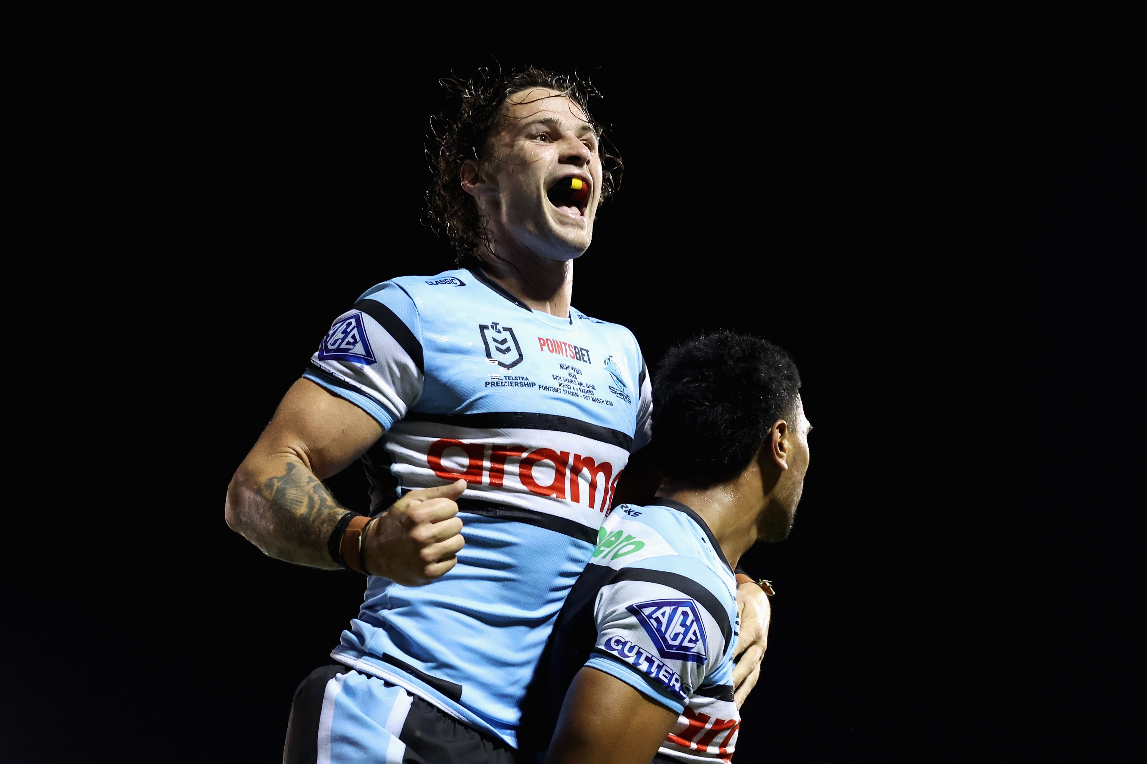 Nicho Hynes celebrates Sharks win. 