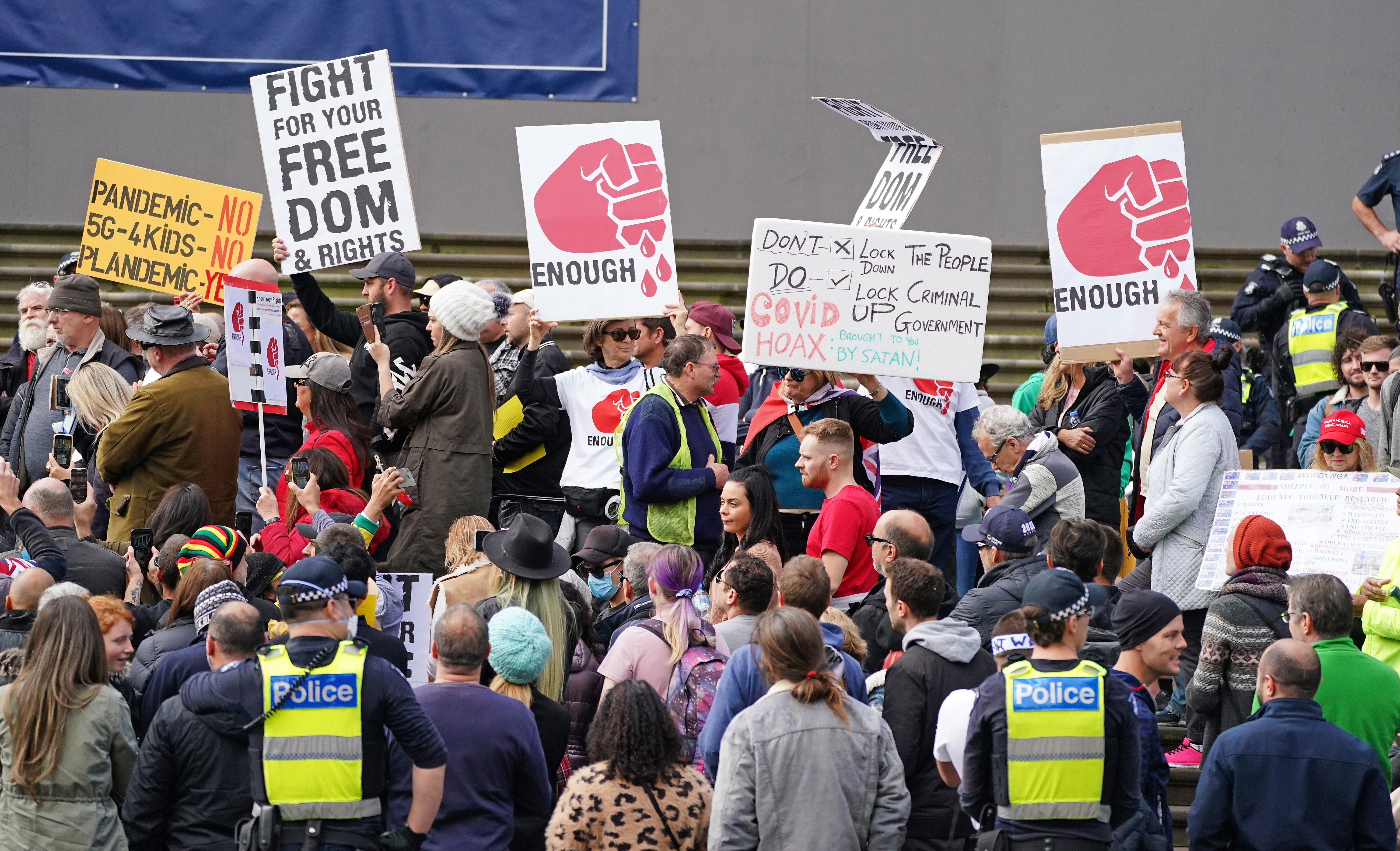 Protesters gather outside Parliament House in Melbourne, Sunday, May 10, 2020. Anti-vaxxers and Victorians fed up with the coronavirus lockdown have broken social distancing rules to protest in Melbourne's CBD on Mother's Day.