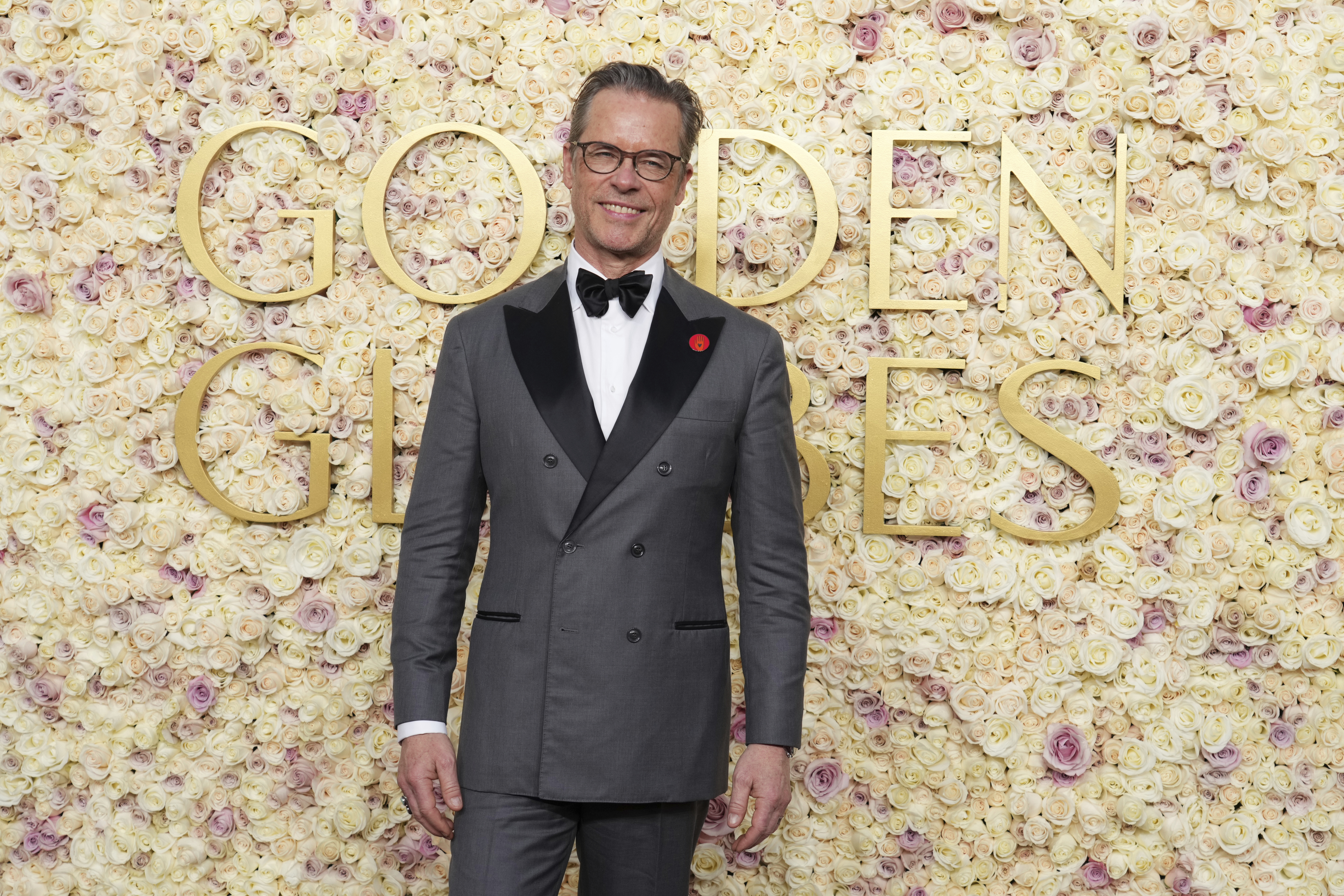 Guy Pearce arrives at the 82nd Golden Globes on Sunday, Jan. 5, 2025, at the Beverly Hilton in Beverly Hills, Calif. (Photo by Jordan Strauss/Invision/AP)