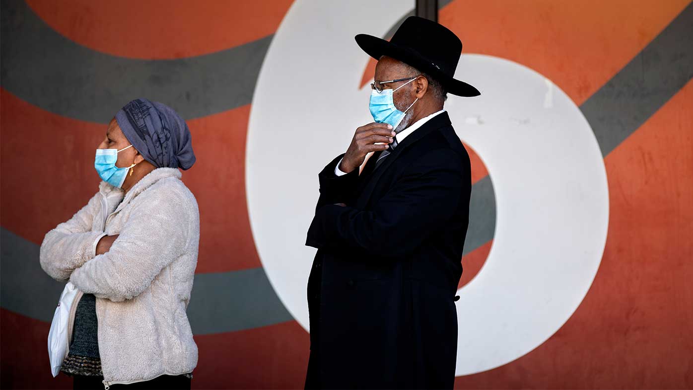 Israelis line up to receive their second dose of the Pfizer COVID-19 vaccine in Tel Aviv.