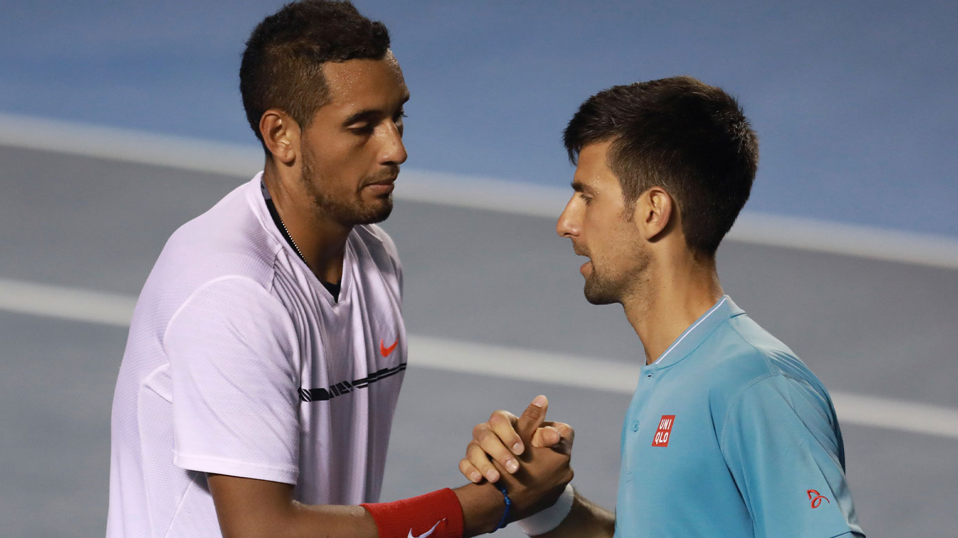 Novak Djokovic of Serbia shakes hands with Nick Kyrgios in 2017