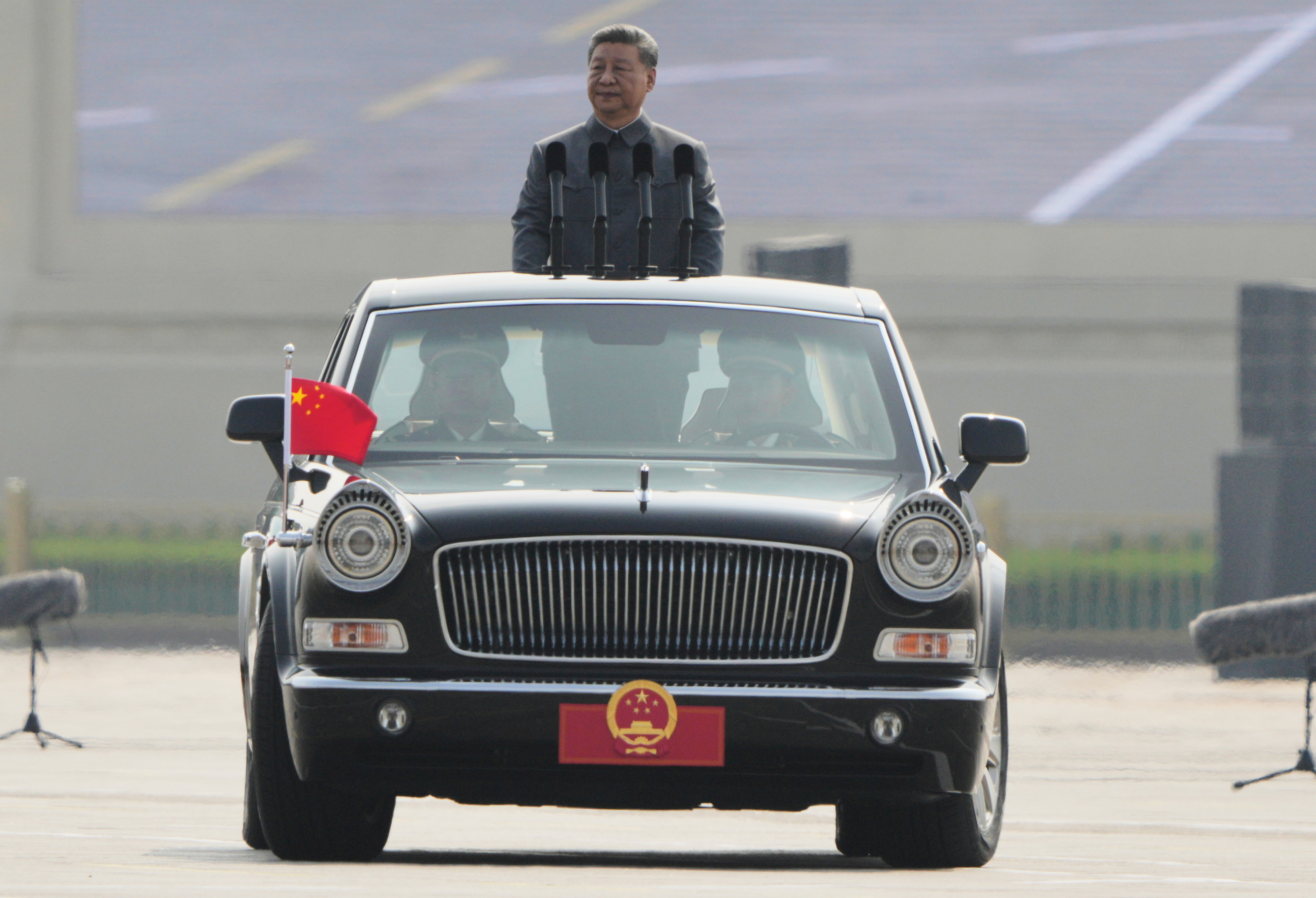 Chinese President Xi Jinping inspects the troops ahead of a military parade to commemorate the 80th anniversary of Japan's World War II surrender held in front of Tiananmen Gate in Beijing.