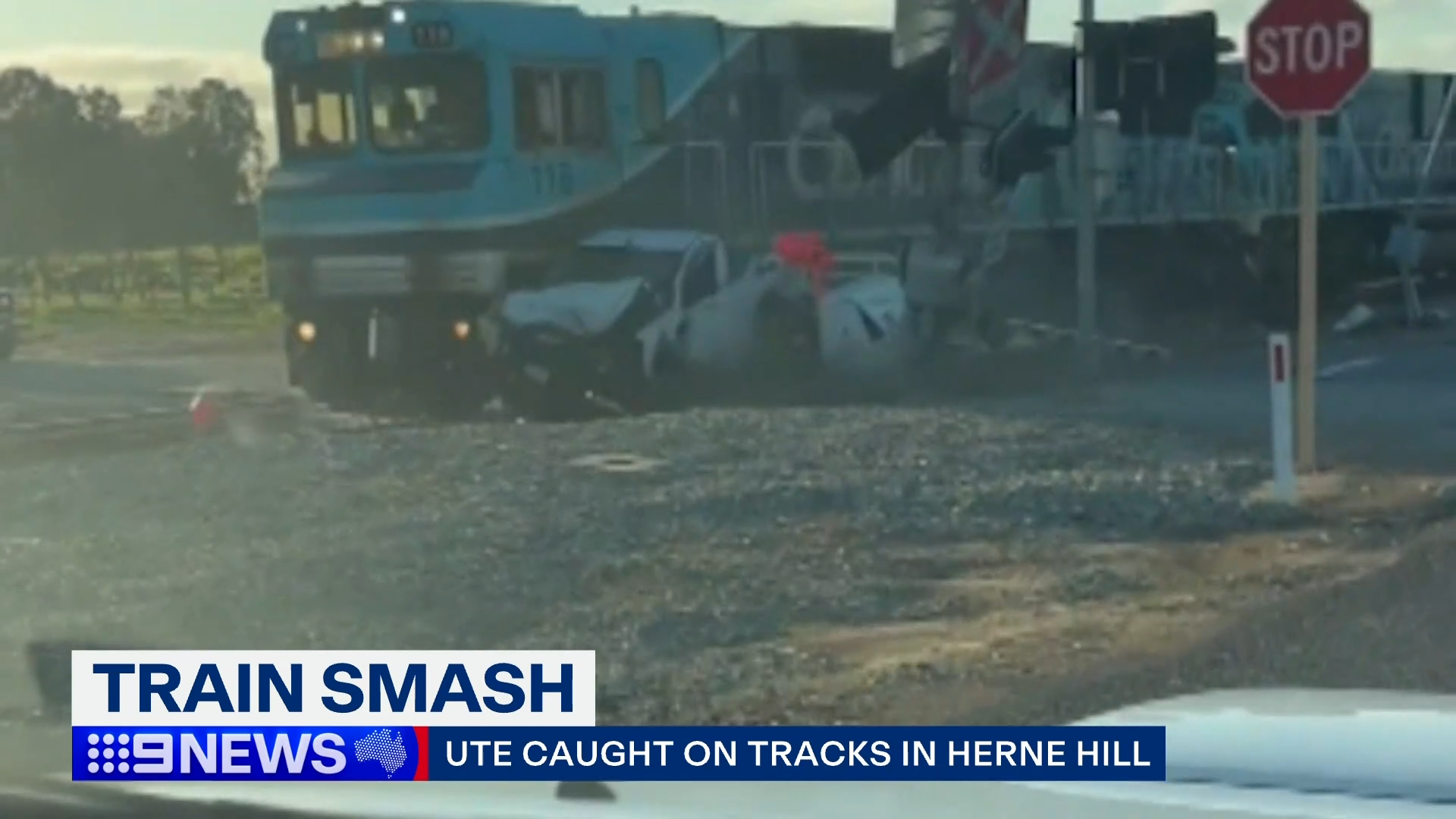 Men's lucky escape before ute smashed by train