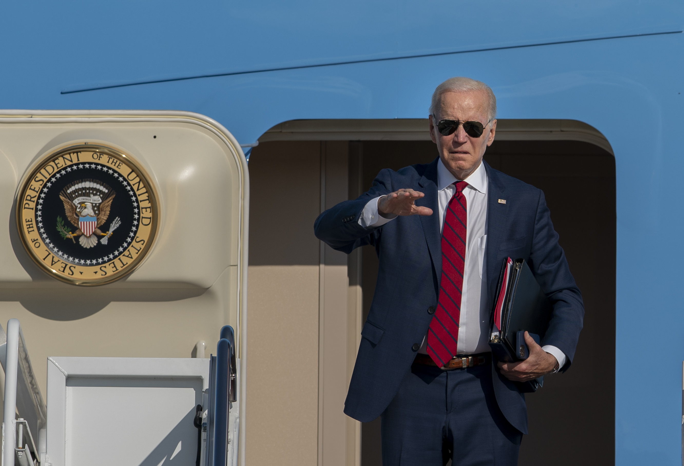 President Joe Biden waves before boarding Air Force One at Andrews Air Force Base, Md., en route a trip to New York to attend the United Nations General Assembly, Tuesday, Sept. 20, 2022.