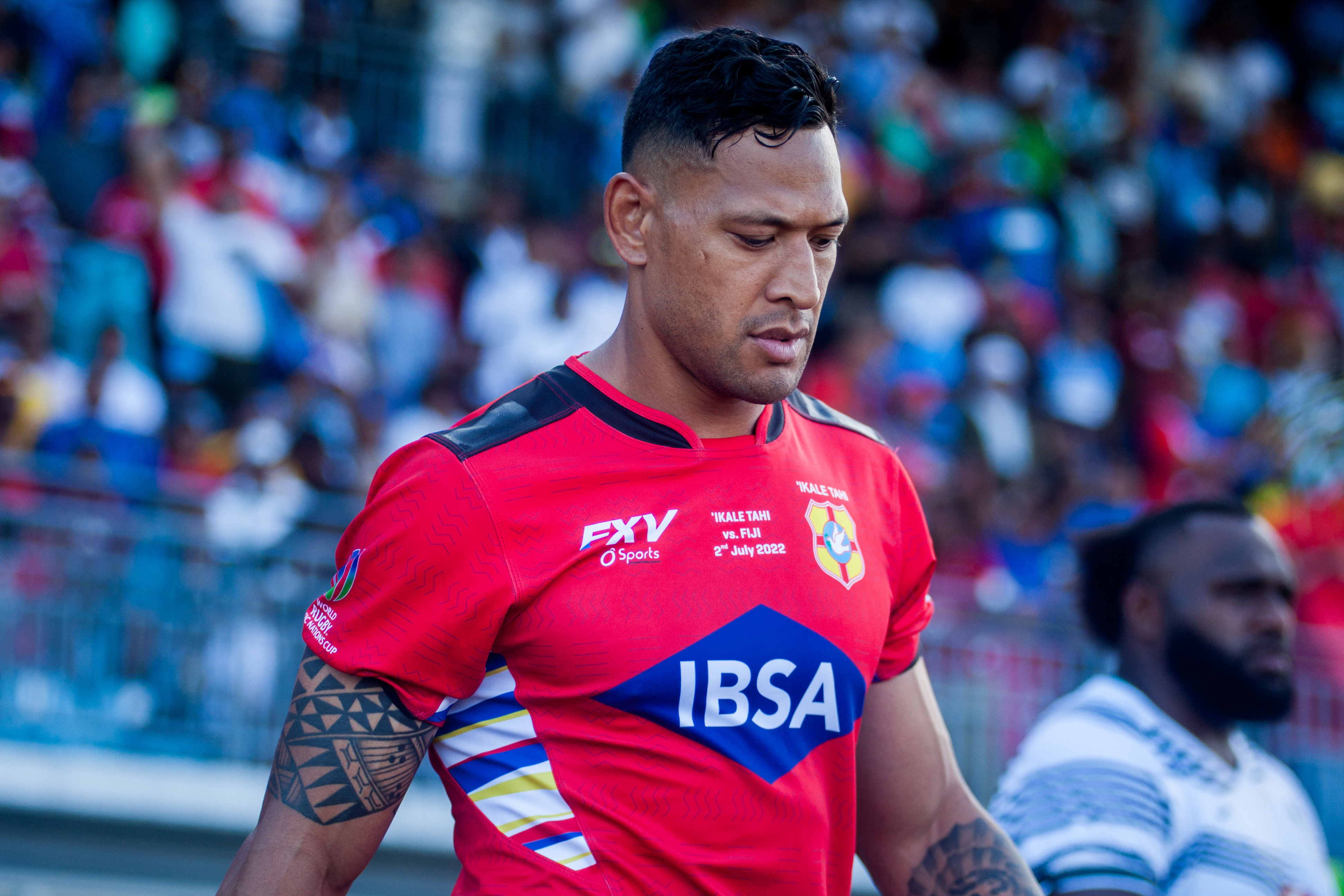Israel Folau takes the field for Tonga in 2022.