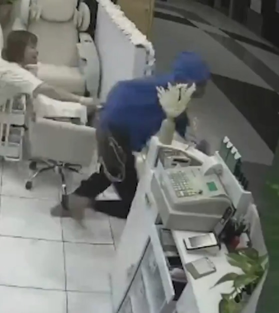Police are searching for a woman who entered a Queensland nail salon and snatched a customer's bag.
