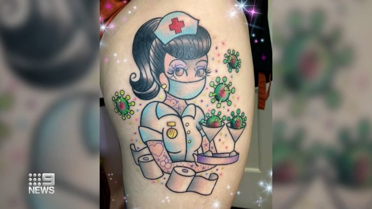 Proudly showcasing my new tattoo as a nurse