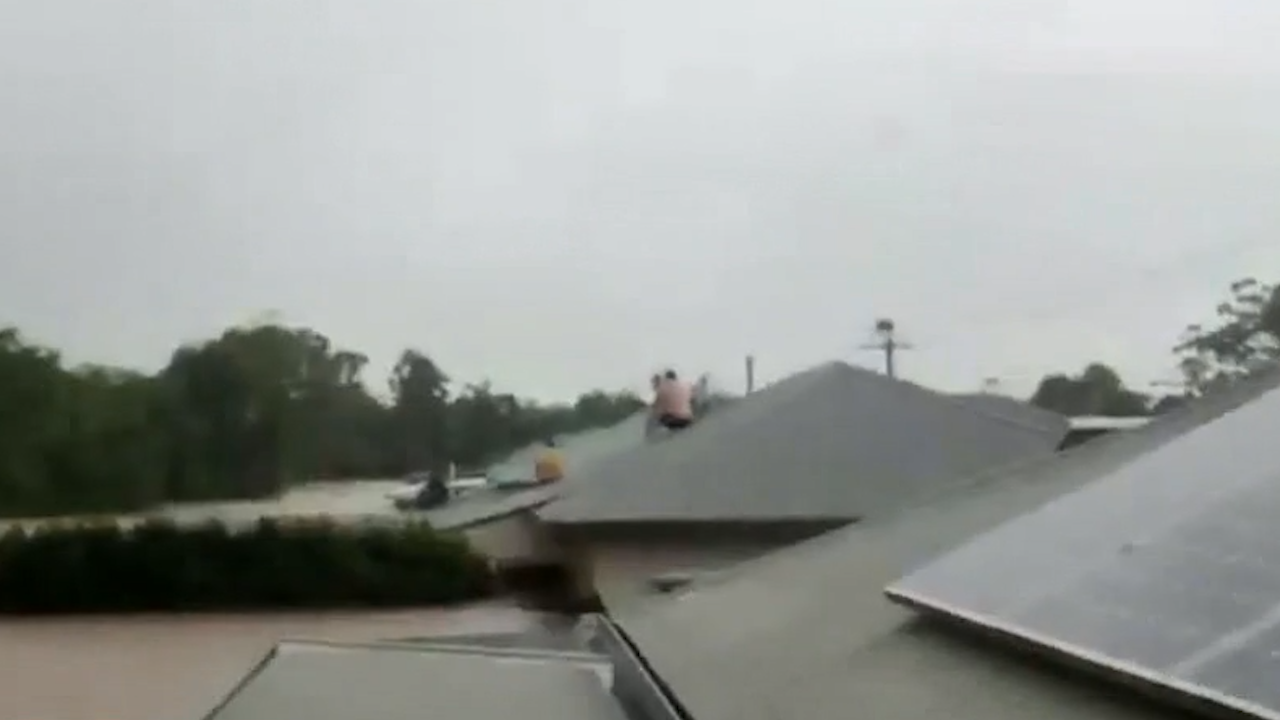 Family stranded on roof Casino Street Lismore Today help rescue in floods