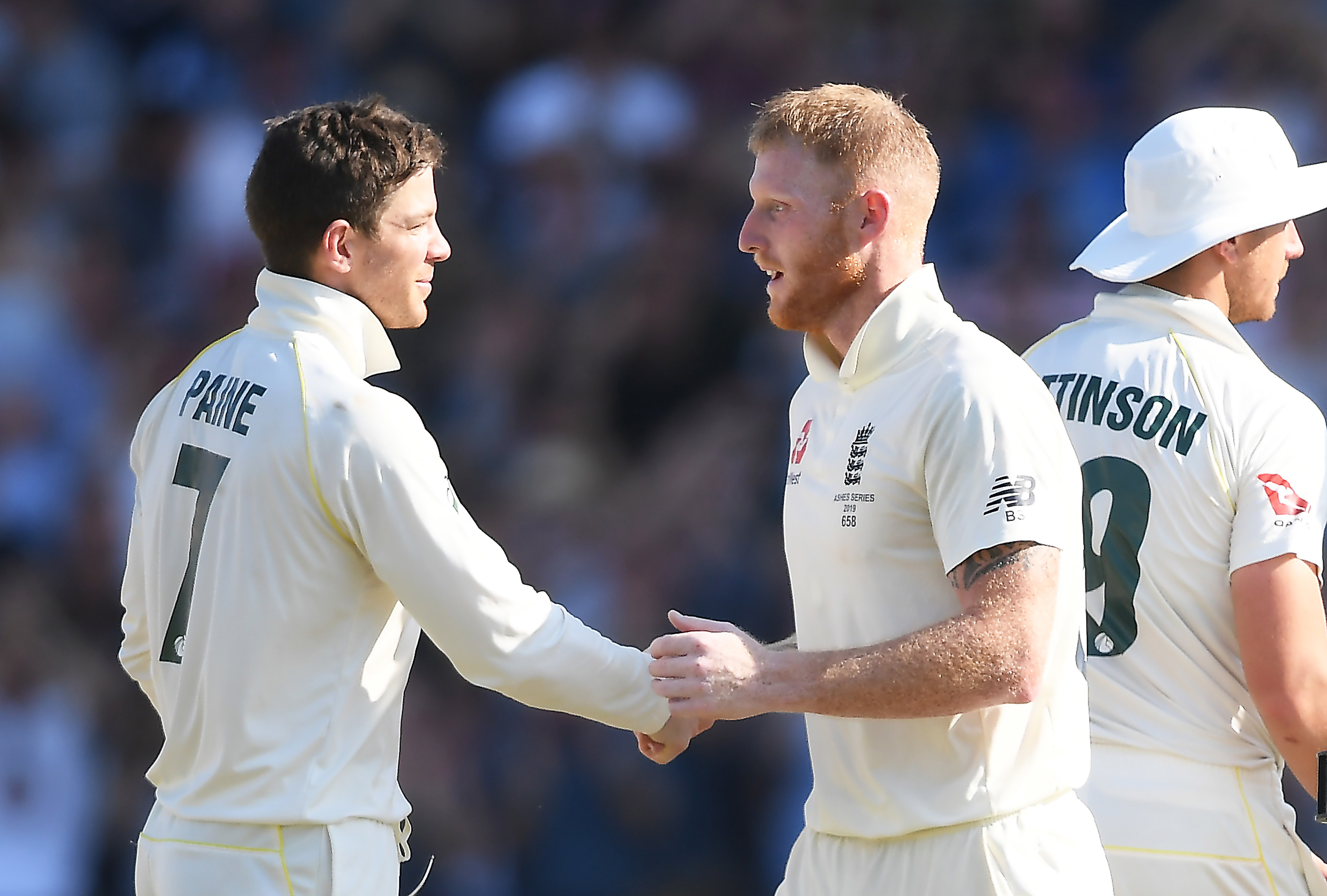 Ben Stokes (r) of England shakes hands with Tim Paine (l) of Australia during Day Four of the 3rd Specsavers Ashes Test match between England and Australia at Headingley on August 25, 2019 in Leeds, England. (Photo by Alex Davidson/Getty Images)