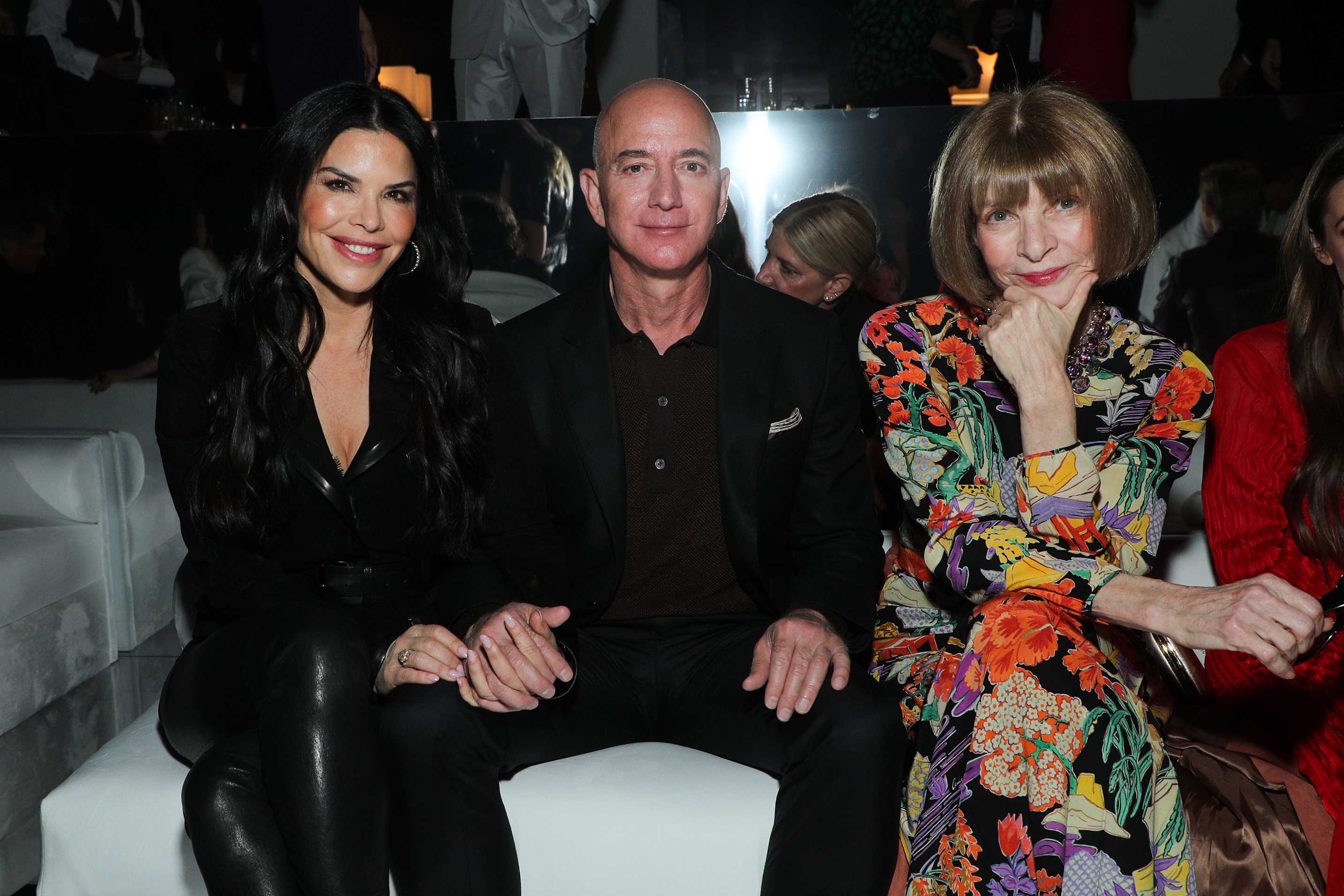 Lauren Sanchez, Jeff Bezos and Anna Wintour in the front row (Photo by John Salangsang/WWD/Penske Media via Getty Images)