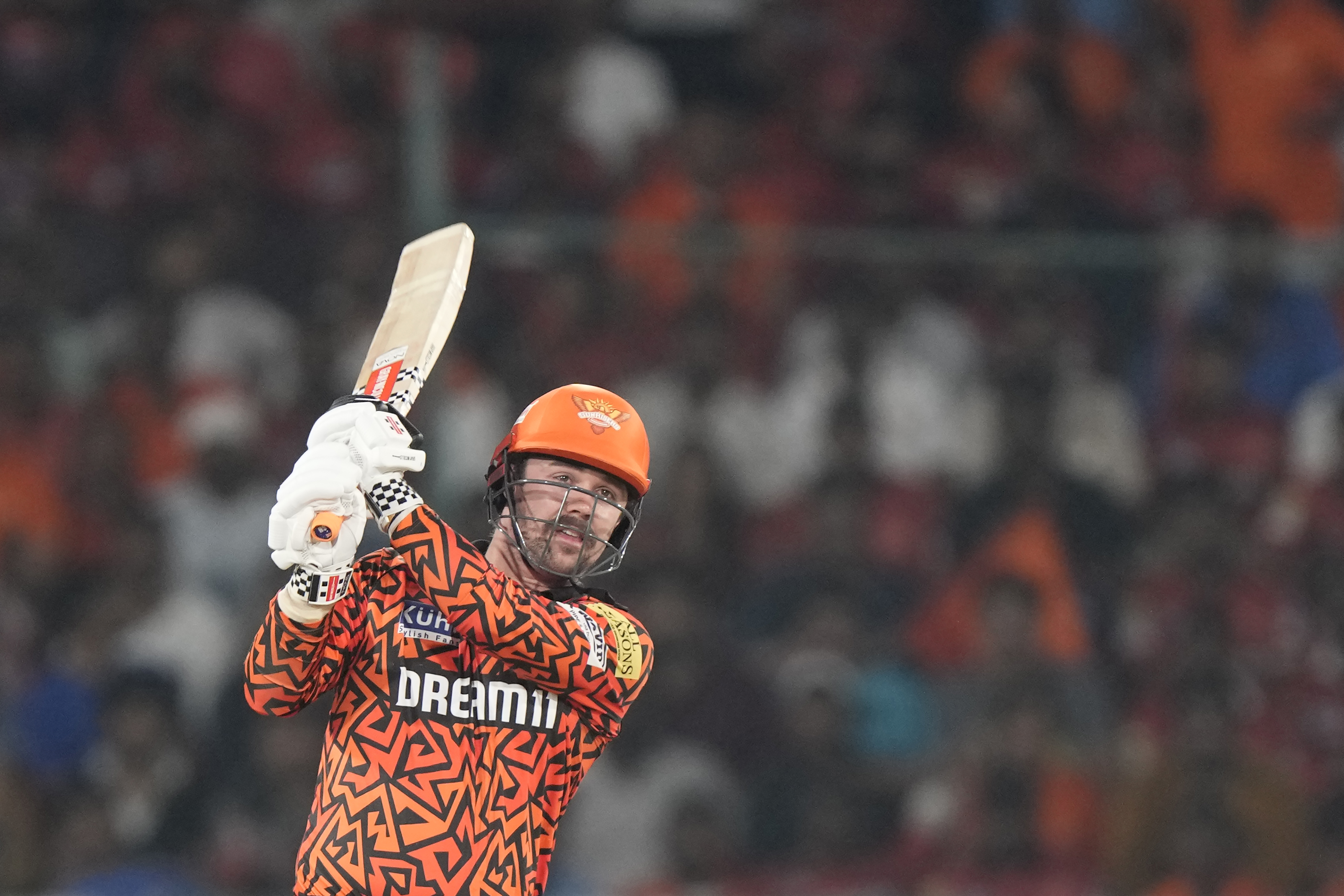 Sunrisers Hyderabad's Travis Head plays a shot during the Indian Premier League cricket match between Sunrisers Hyderabad and Lucknow Super Giants in Hyderabad, India, Wednesday, May 8, 2024. (AP Photo/Mahesh Kumar A.)