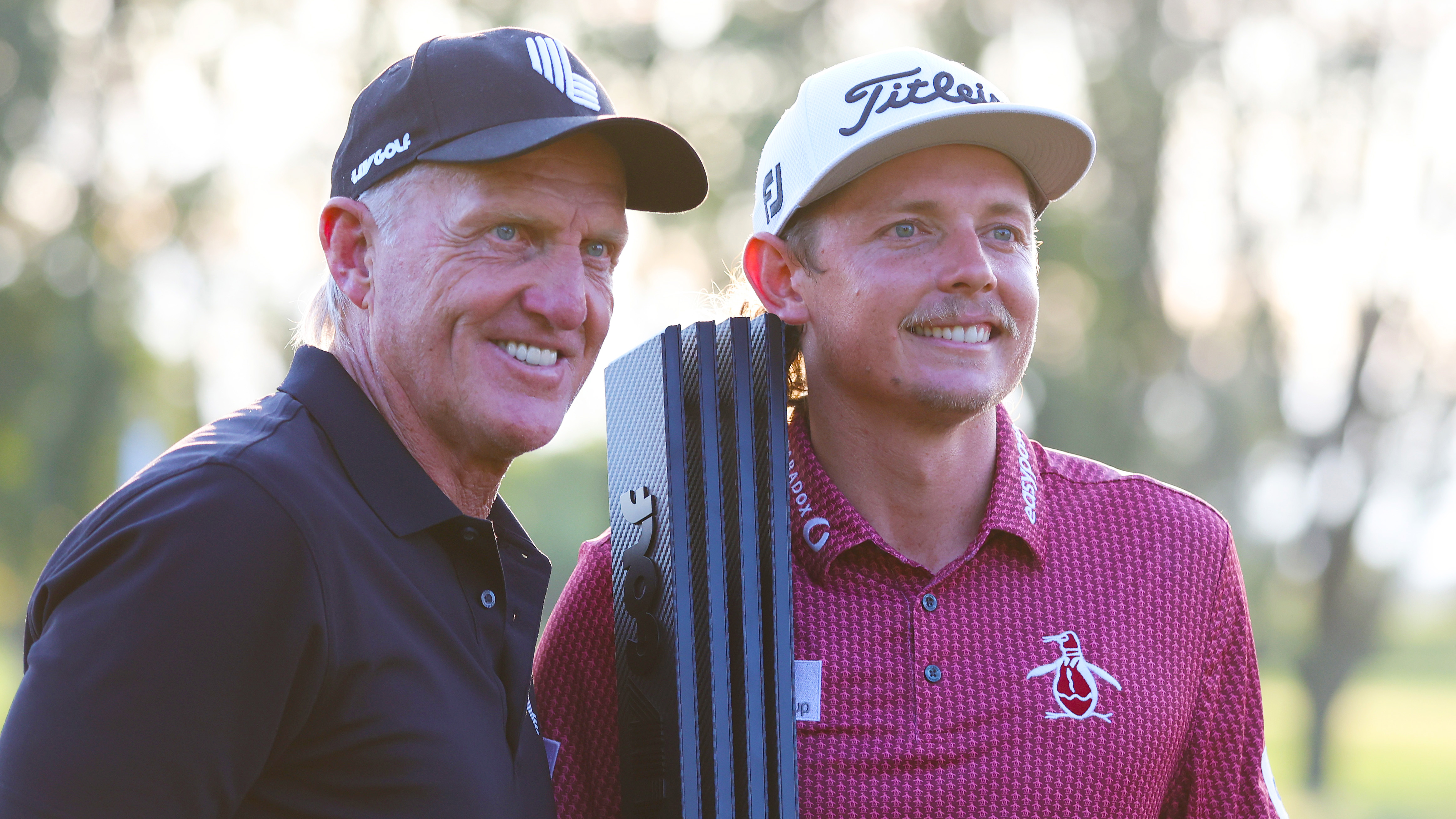 Cameron Smith of Punch GC poses with Greg Norman, CEO and commissioner of LIV Golf, after winning the individual title during Day Three of the LIV Golf Invitational - Chicago at Rich Harvest Farms on September 18, 2022 in Sugar Grove, Illinois. (Photo by Jonathan Ferrey/LIV Golf via Getty Images)