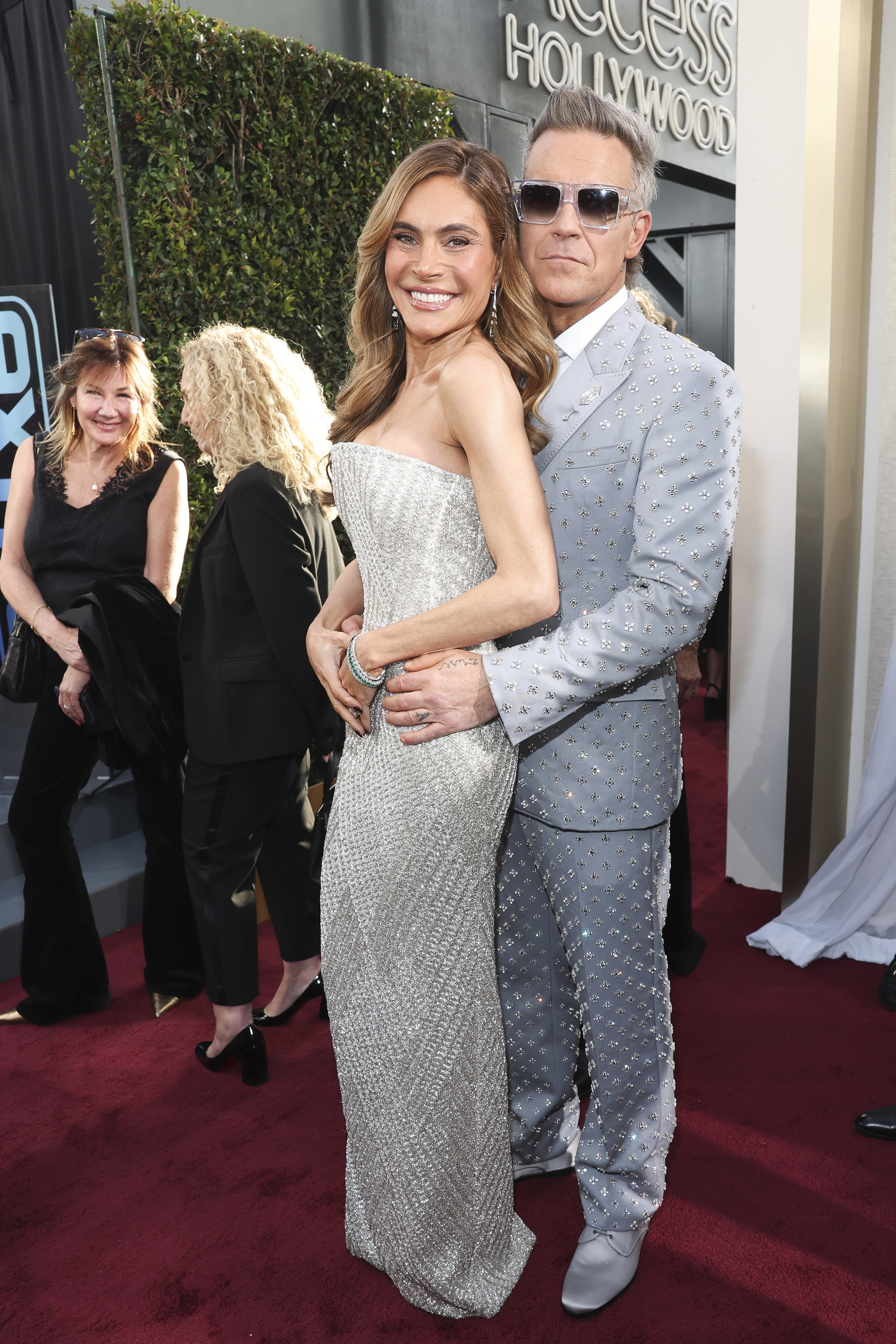 Robbie Williams and Ayda Field at the 82ND ANNUAL GOLDEN GLOBES®, airing live from the Beverly Hilton in Beverly Hills, California on Sunday, January 5, 2025 at 8 PM ET/5 PM PT, on CBS and streaming on Paramount+. Photo: Stewart Cook/CBS ©2025 CBS Broadcasting, Inc. All Rights Reserved.