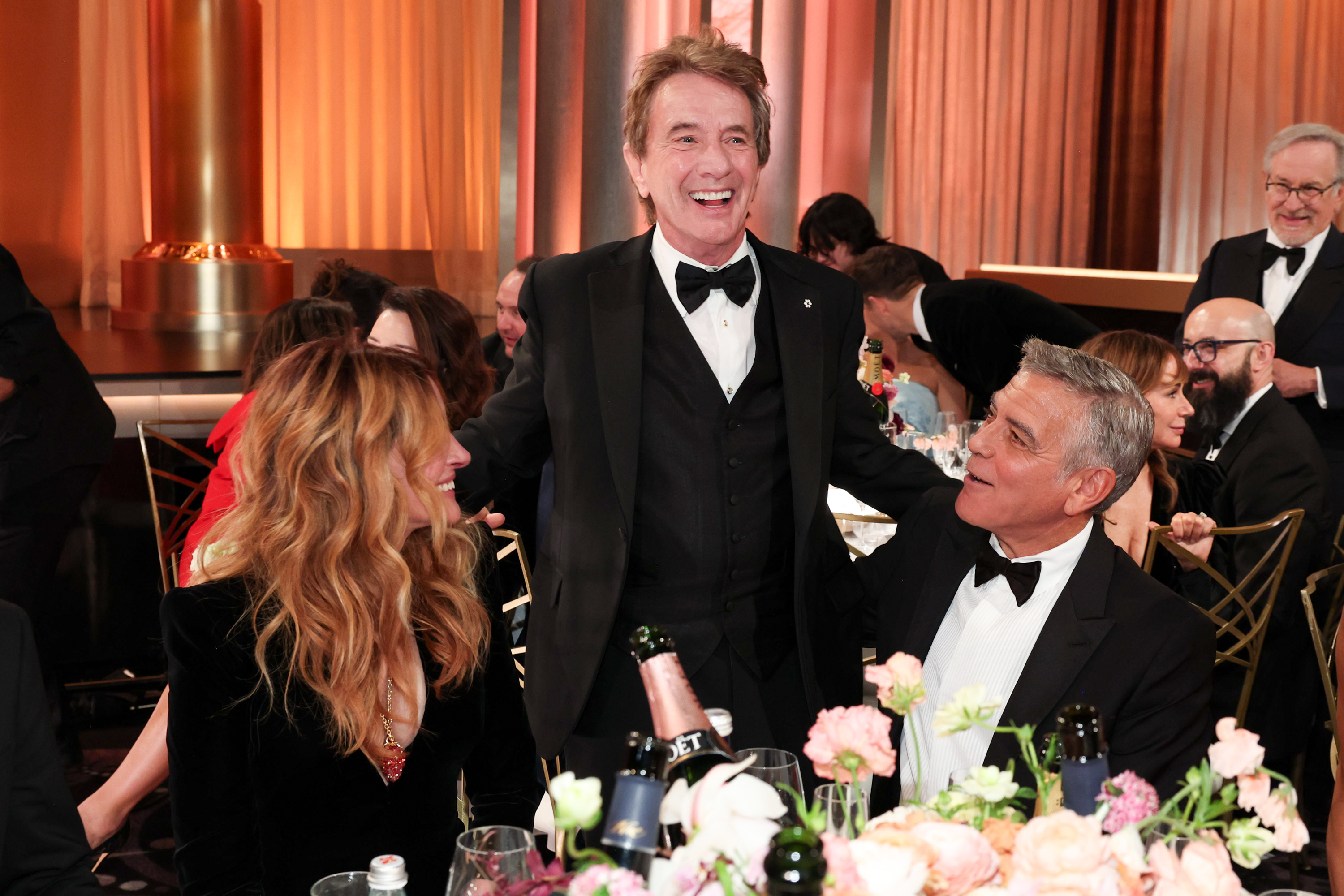 Julia Roberts, Martin Short and George Clooney at the 83rd Annual Golden Globes held at The Beverly Hilton on January 11, 2026 in Beverly Hills, California. (Photo by Christopher Polk/2026GG/Penske Media via Getty Images)