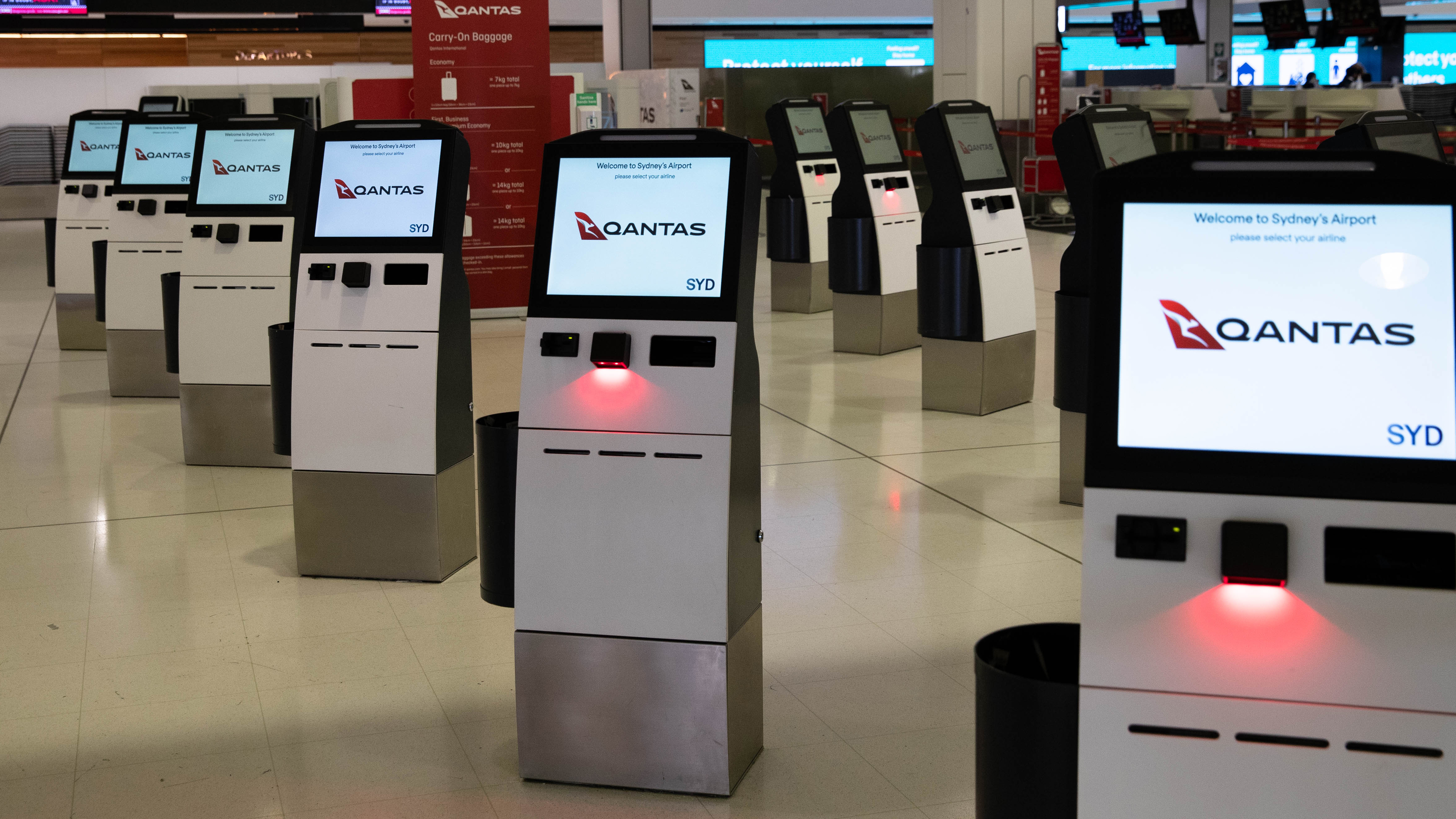 An empty Qantas check in area at Sydney International Airport. 