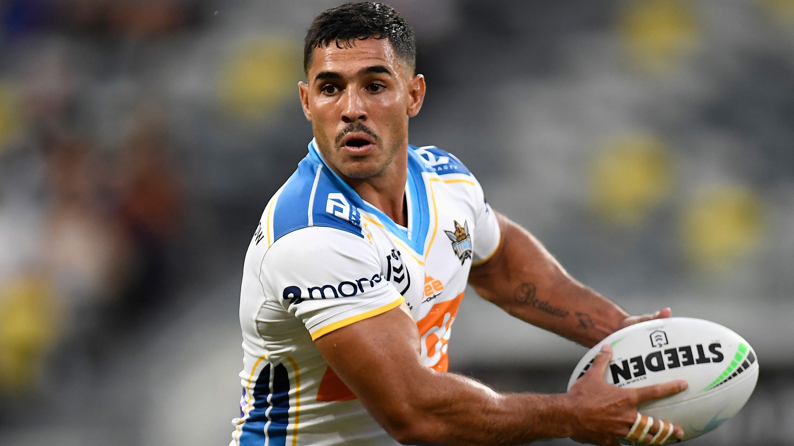 Jamal Fogarty runs the ball in the Titans' final against the Roosters.