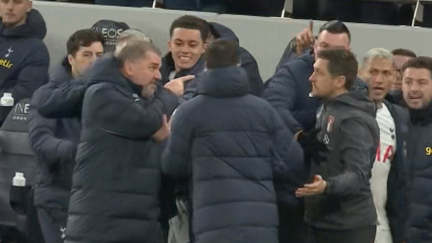 Tottenham manager Ange Postecoglou was given a yellow card for his involvement in a fiery sideline stoush late in his side's win against Bournemouth.