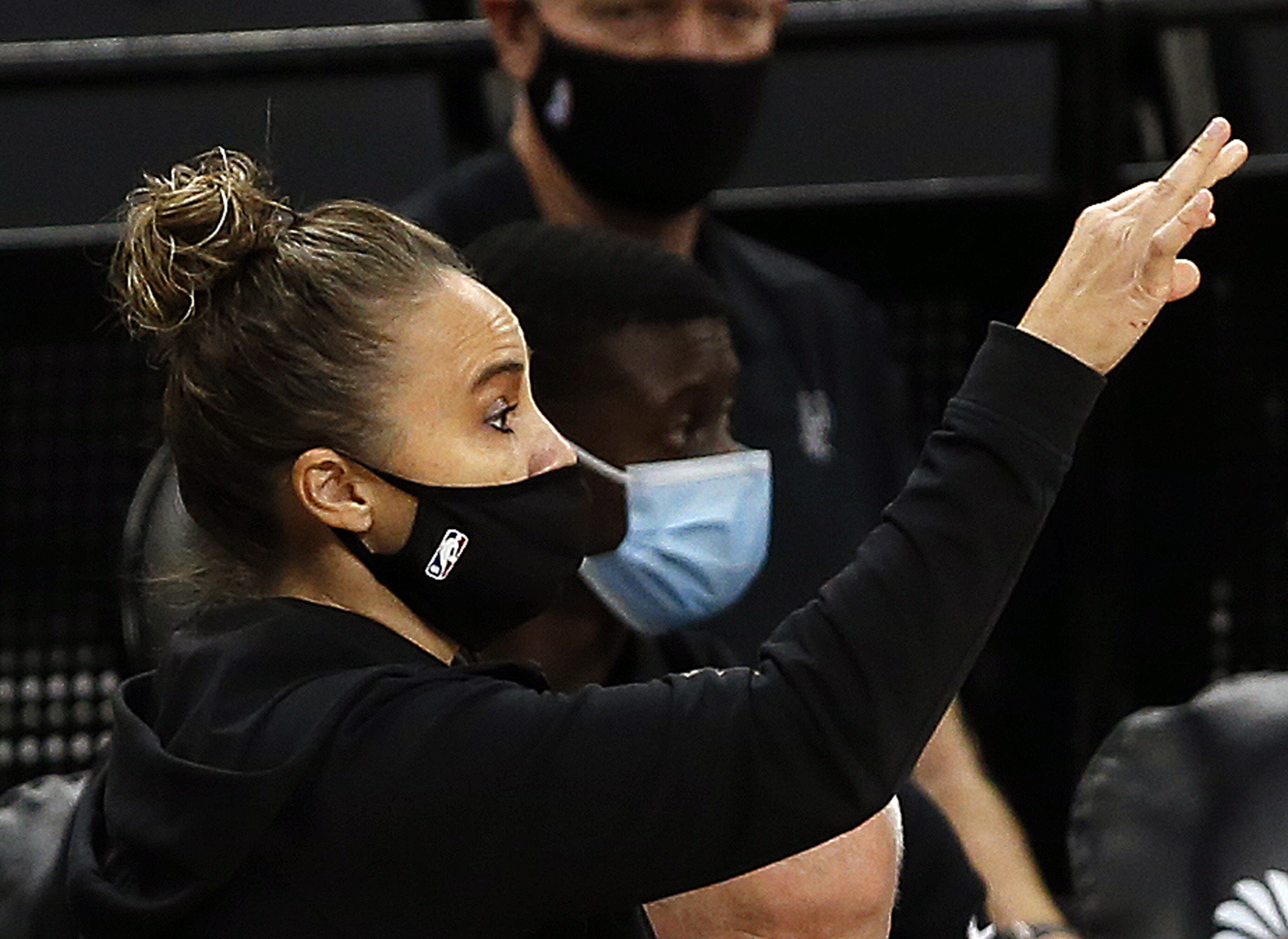 Becky Hammon of the San Antonio Spurs took over head coach duties.