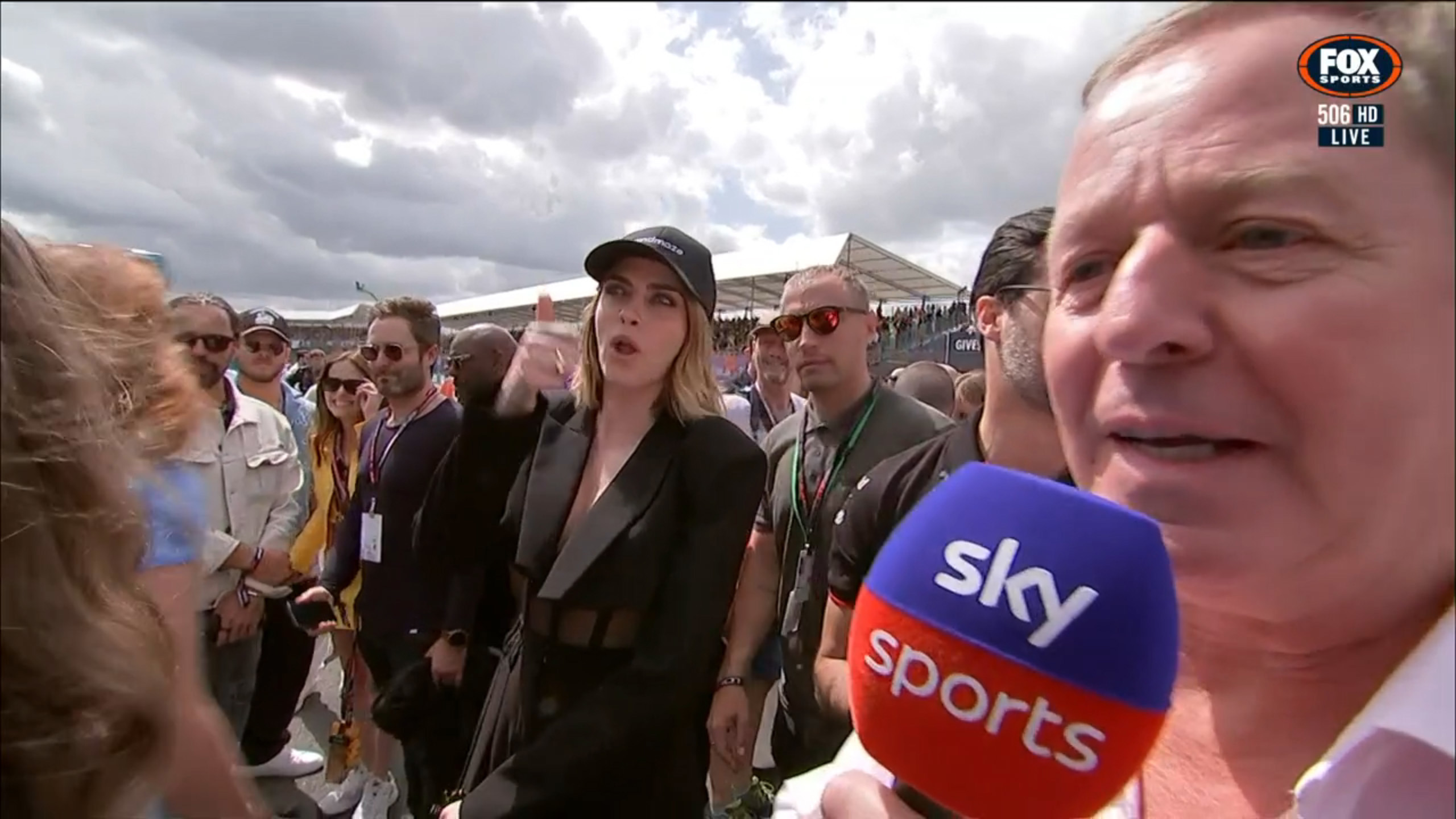 Martin Brundle turns after Cara Delevigne denied him an interview.