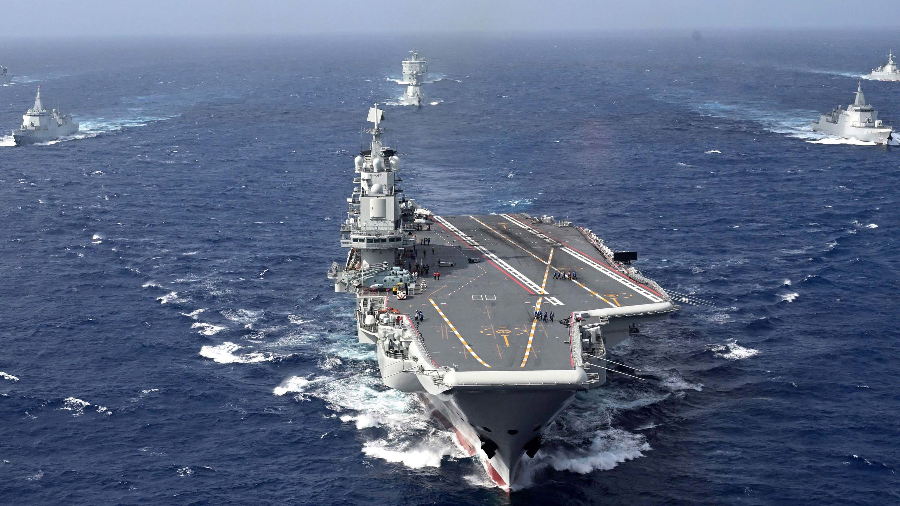 Conventionally powered Chinese aircraft carrier Liaoning carries out a dual aircraft carrier formation exercise with the Shandong aircraft carrier, unseen, for the first time in the South China Sea in late October.