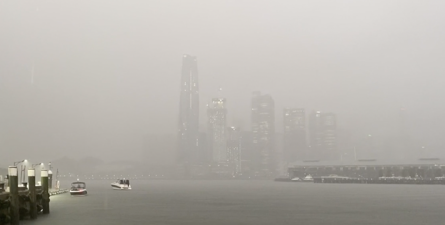 The Sydney skyline was obscured by heavy rain yesterday.