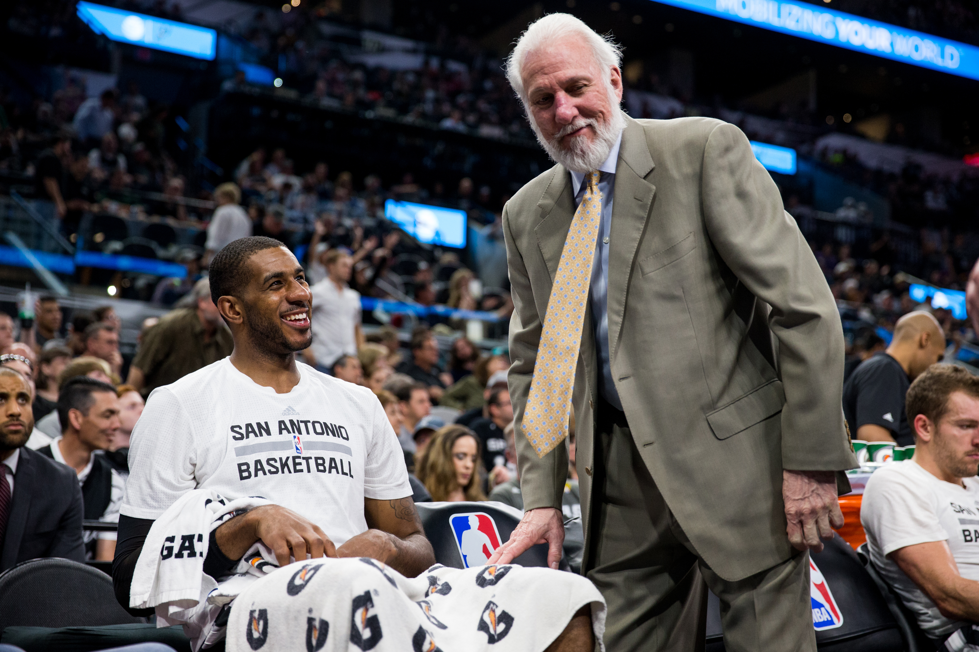 SAN ANTONIO, TX - MARCH 19: Head Coach Gregg Popovich talks with LaMarcus Aldridge #12 of the San Antonio Spurs during the game against the Sacramento Kings on March 19, 2017 at the AT&T Center in San Antonio, Texas. 