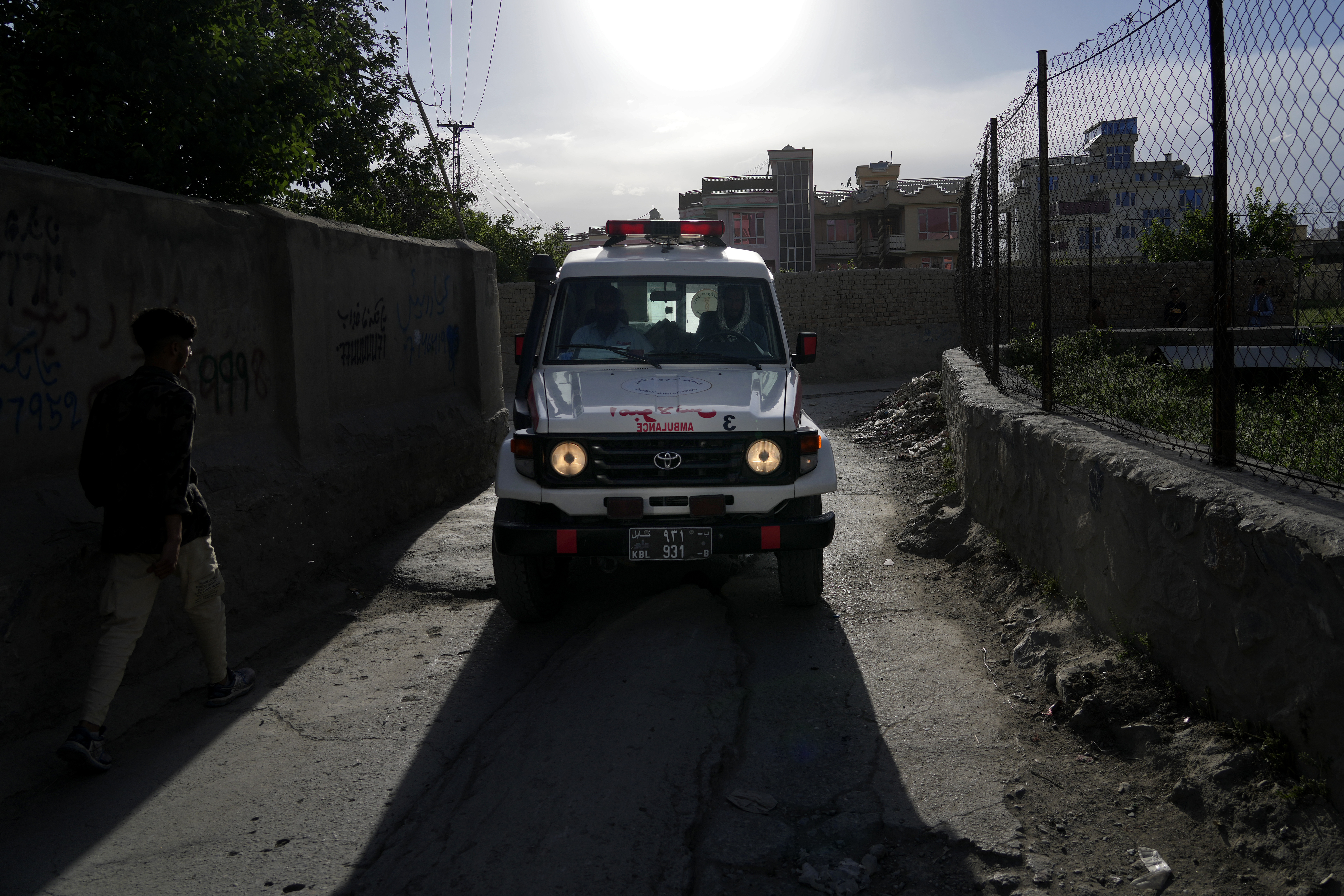 Ambulance carrying wounded people leaves the site of an explosion in Kabul, Afghanistan, Friday, April 29, 2022. A powerful explosion ripped through a mosque in the Afghan capital of Kabul on Friday, killing at least 10 people and wounding 20, a Taliban spokesman said. (AP Photo/Ebrahim Noroozi)